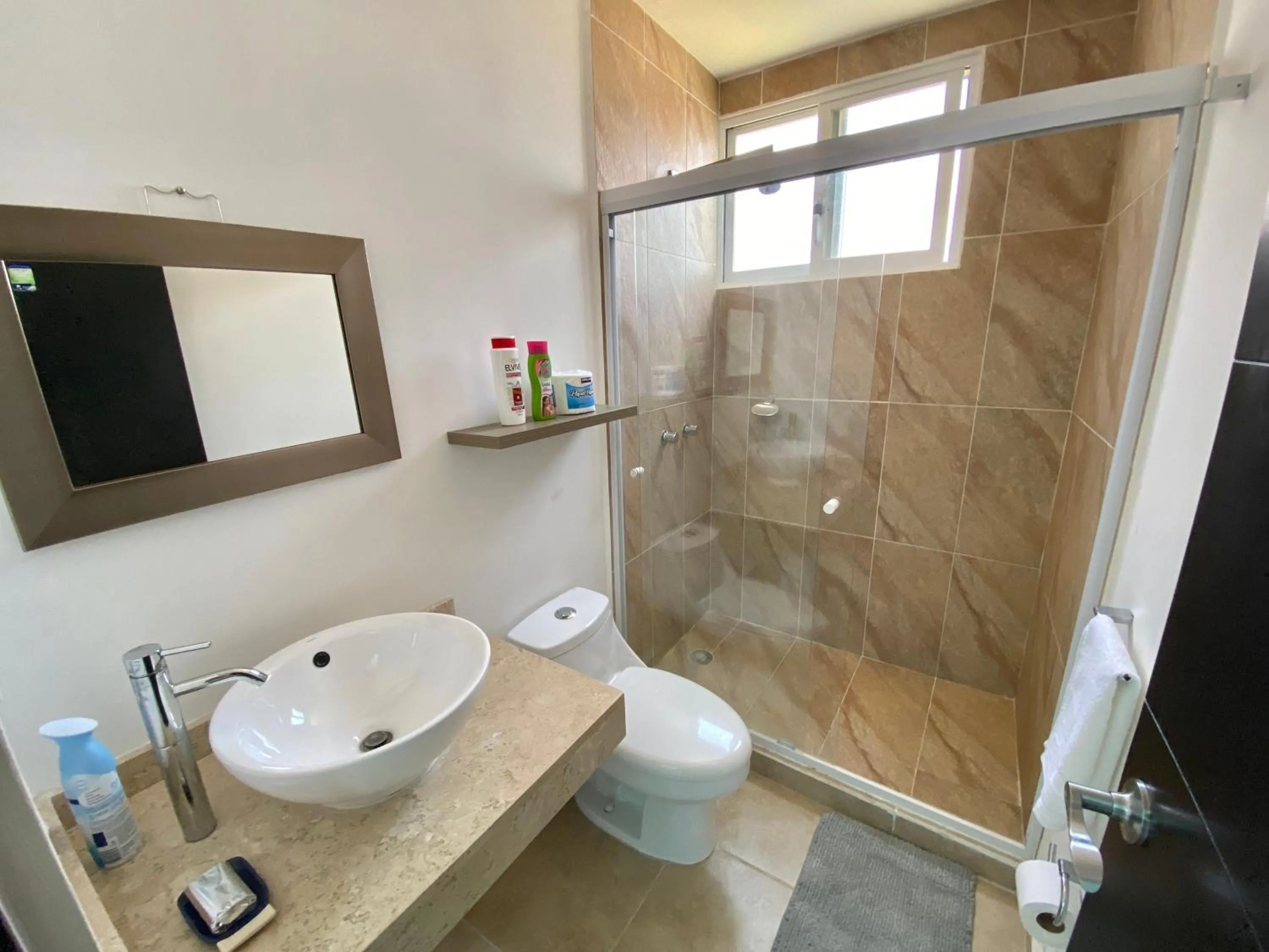 Shower in Dreams Lagoon by Andiani Travel