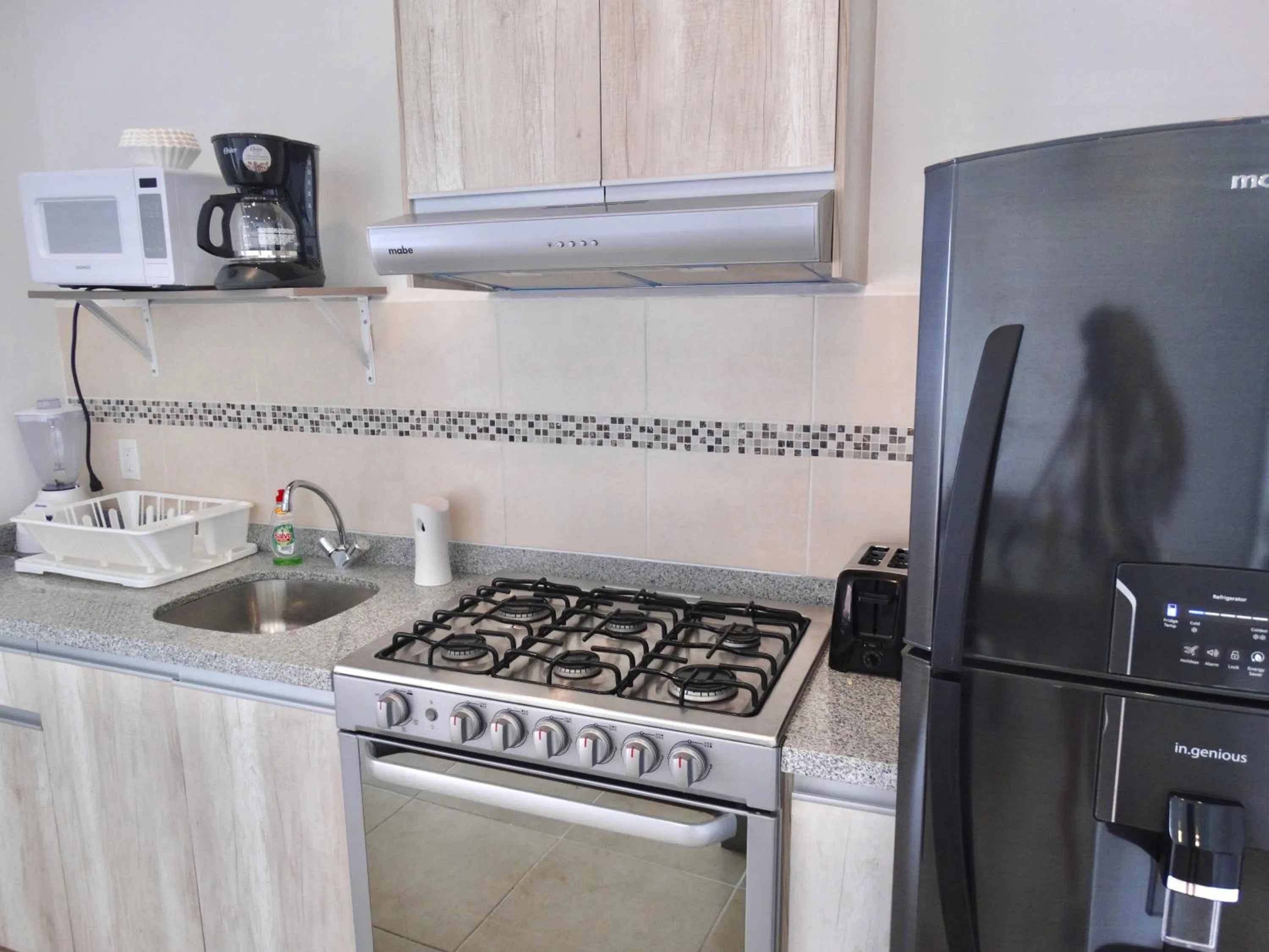 Kitchen or kitchenette in Dreams Lagoon by Andiani Travel