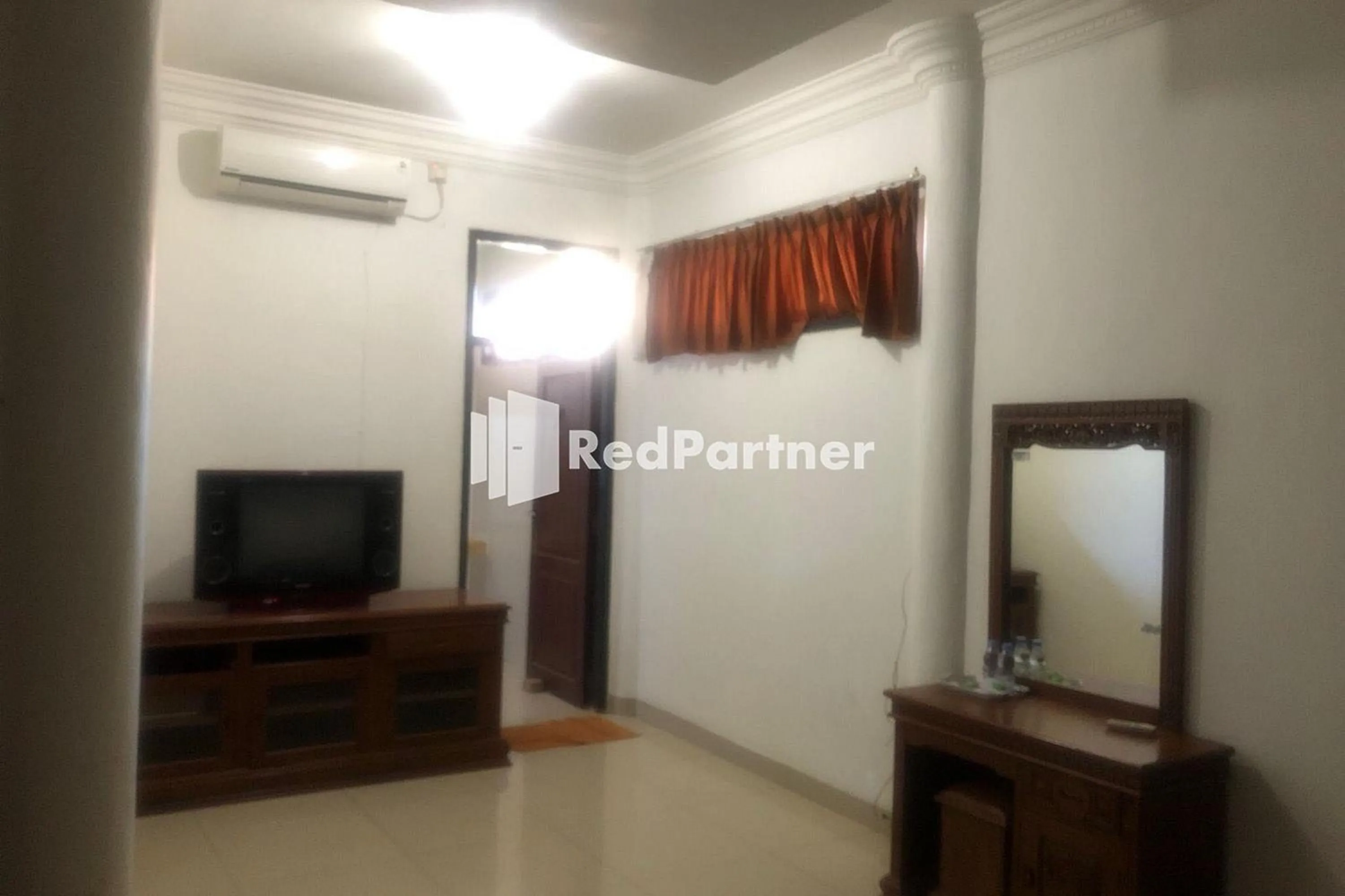 TV and multimedia in Hotel Abna Sangatta Mitra RedDoorz