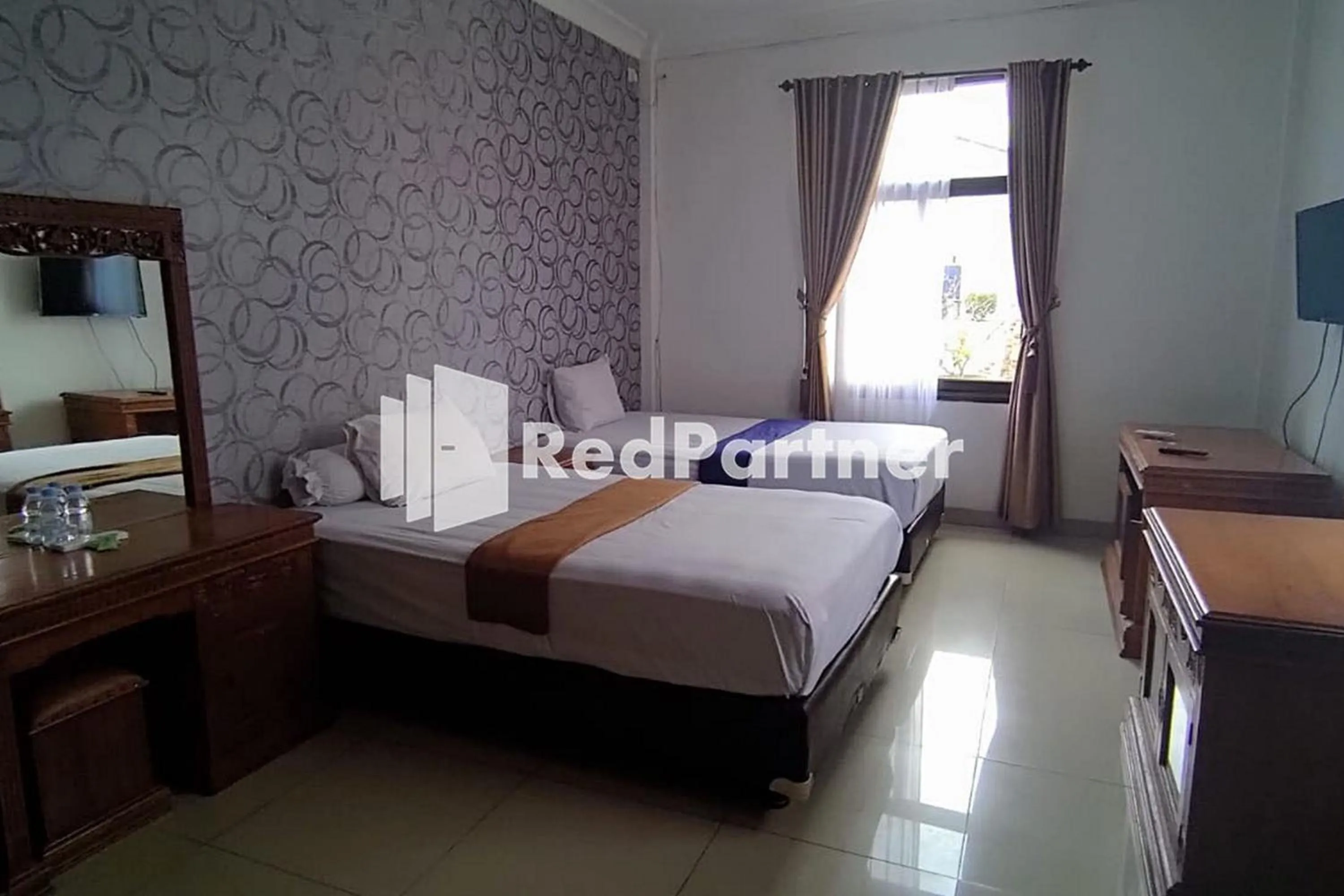 Bed in Hotel Abna Sangatta Mitra RedDoorz