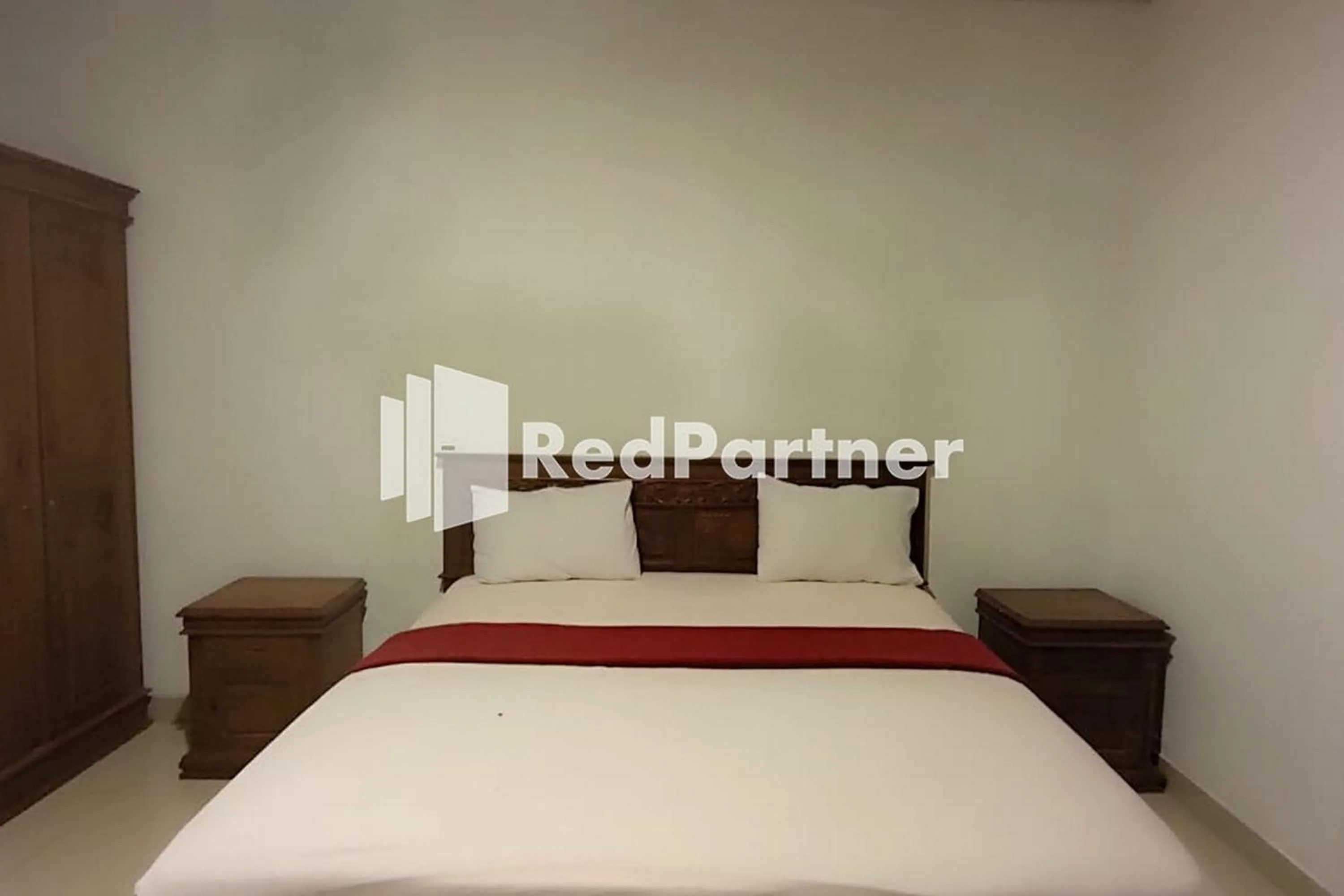 Bed in Hotel Abna Sangatta Mitra RedDoorz