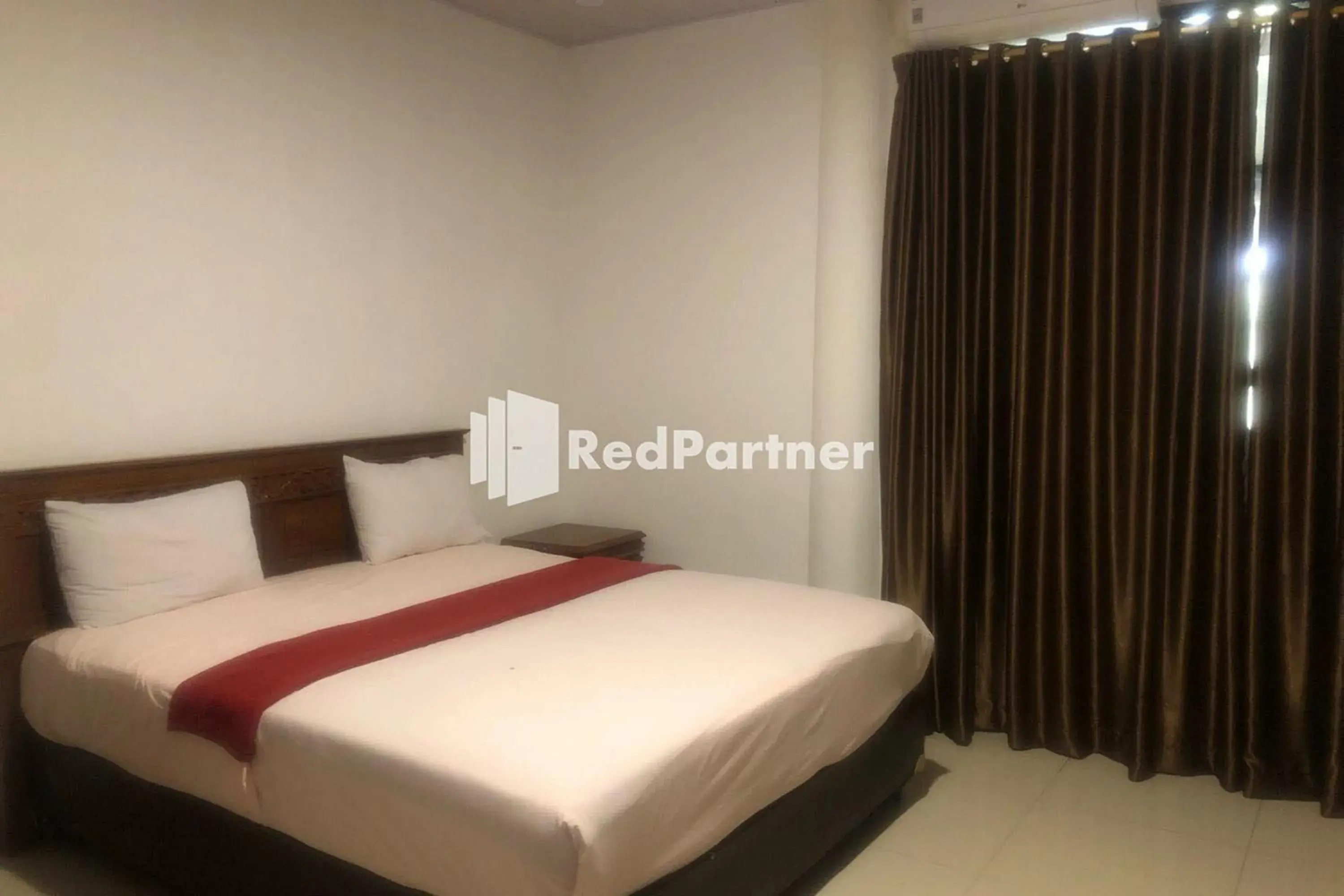 Bed in Hotel Abna Sangatta Mitra RedDoorz Bed in Hotel Abna Sangatta Mitra RedDoorz