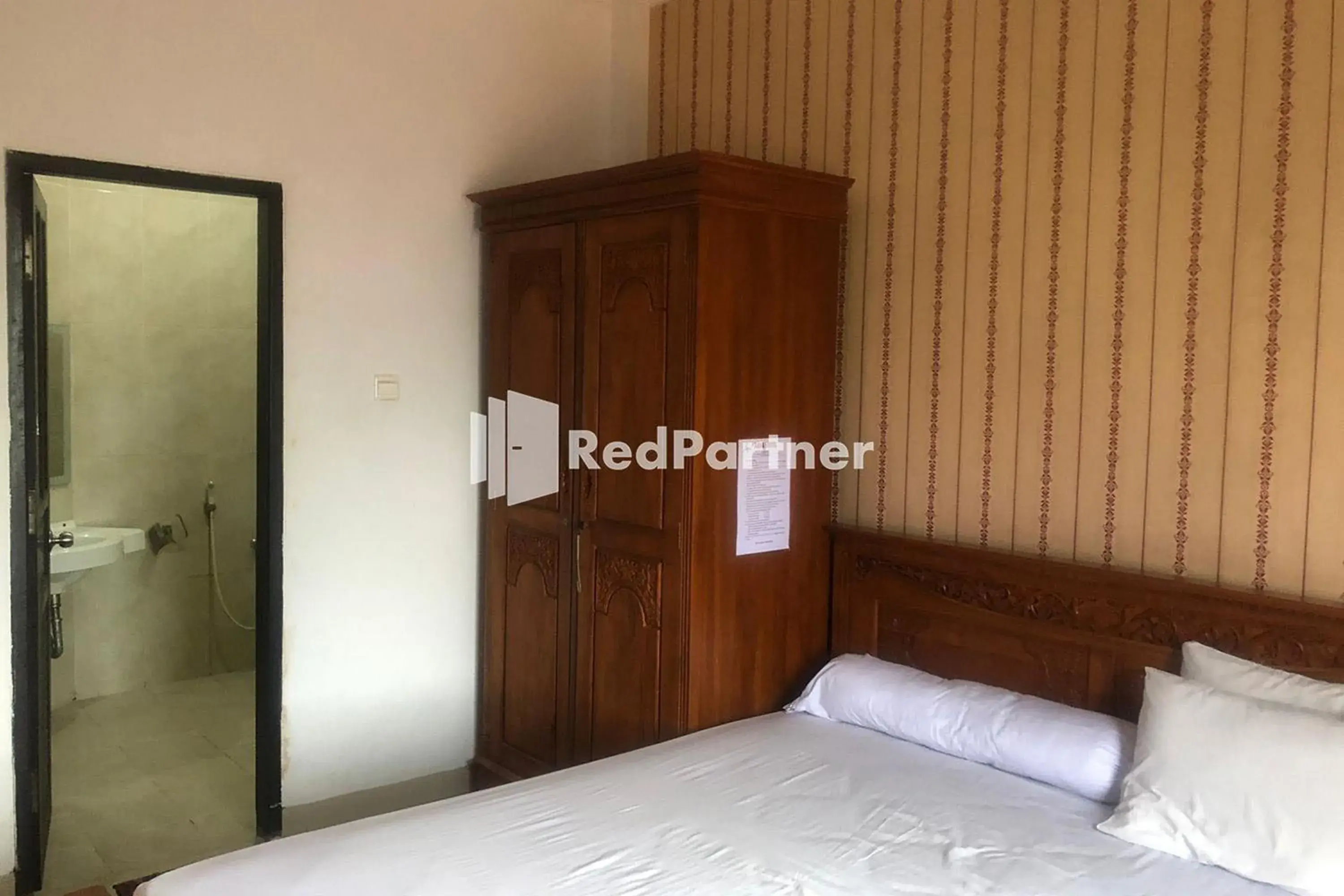 Bed in Hotel Abna Sangatta Mitra RedDoorz Bed in Hotel Abna Sangatta Mitra RedDoorz