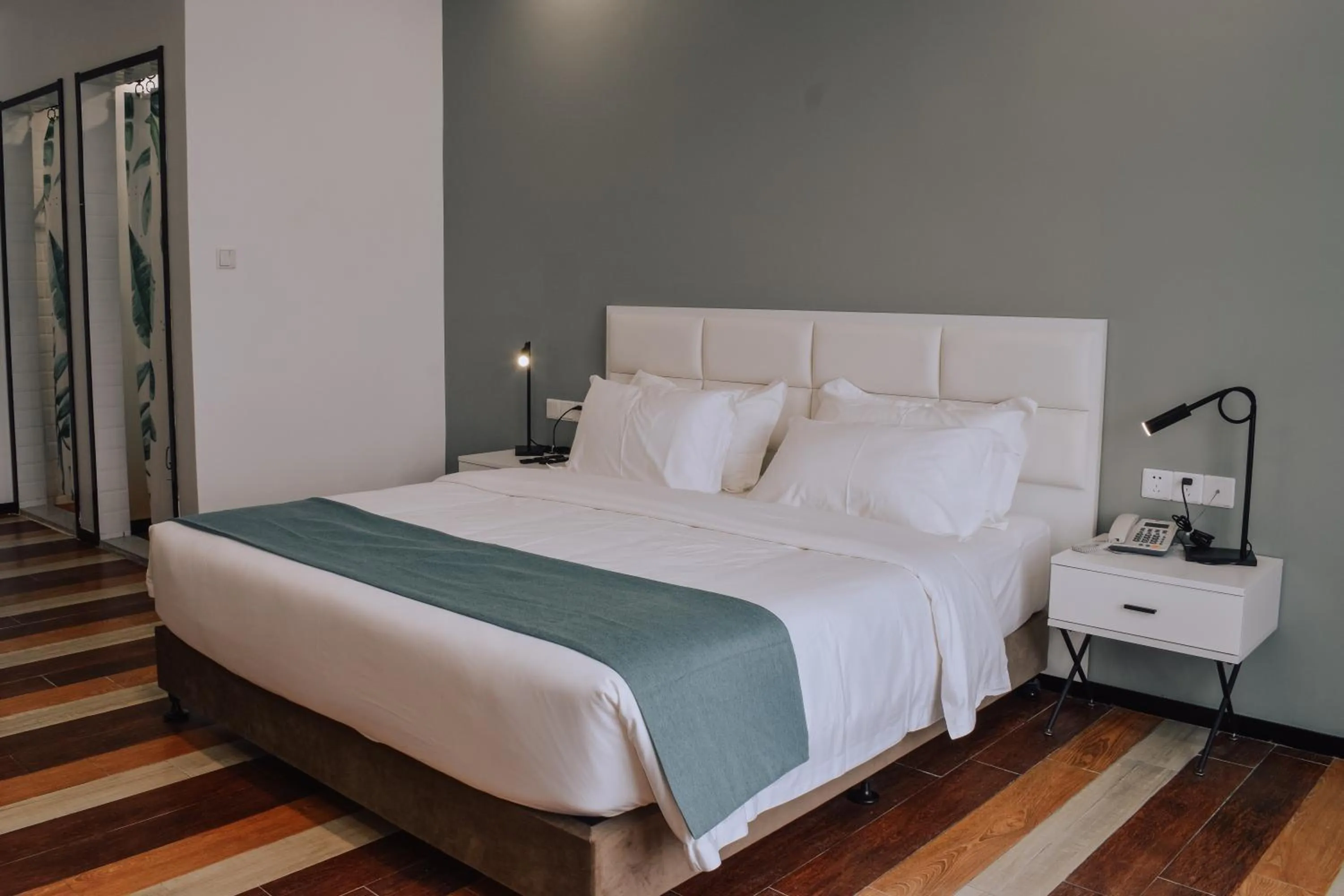 Bed in Fan's Hotel Baybay