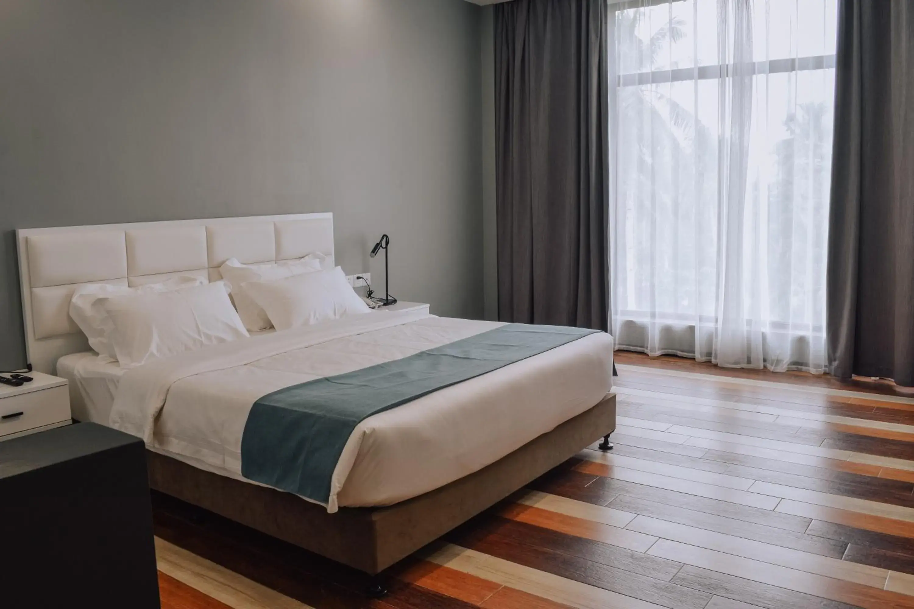 Bed in Fan's Hotel Baybay Bed in Fan's Hotel Baybay