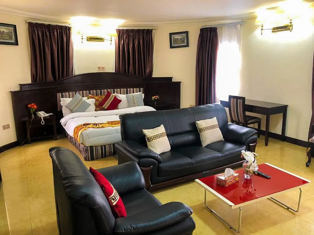 Living room, Bed in Sonia Hotel