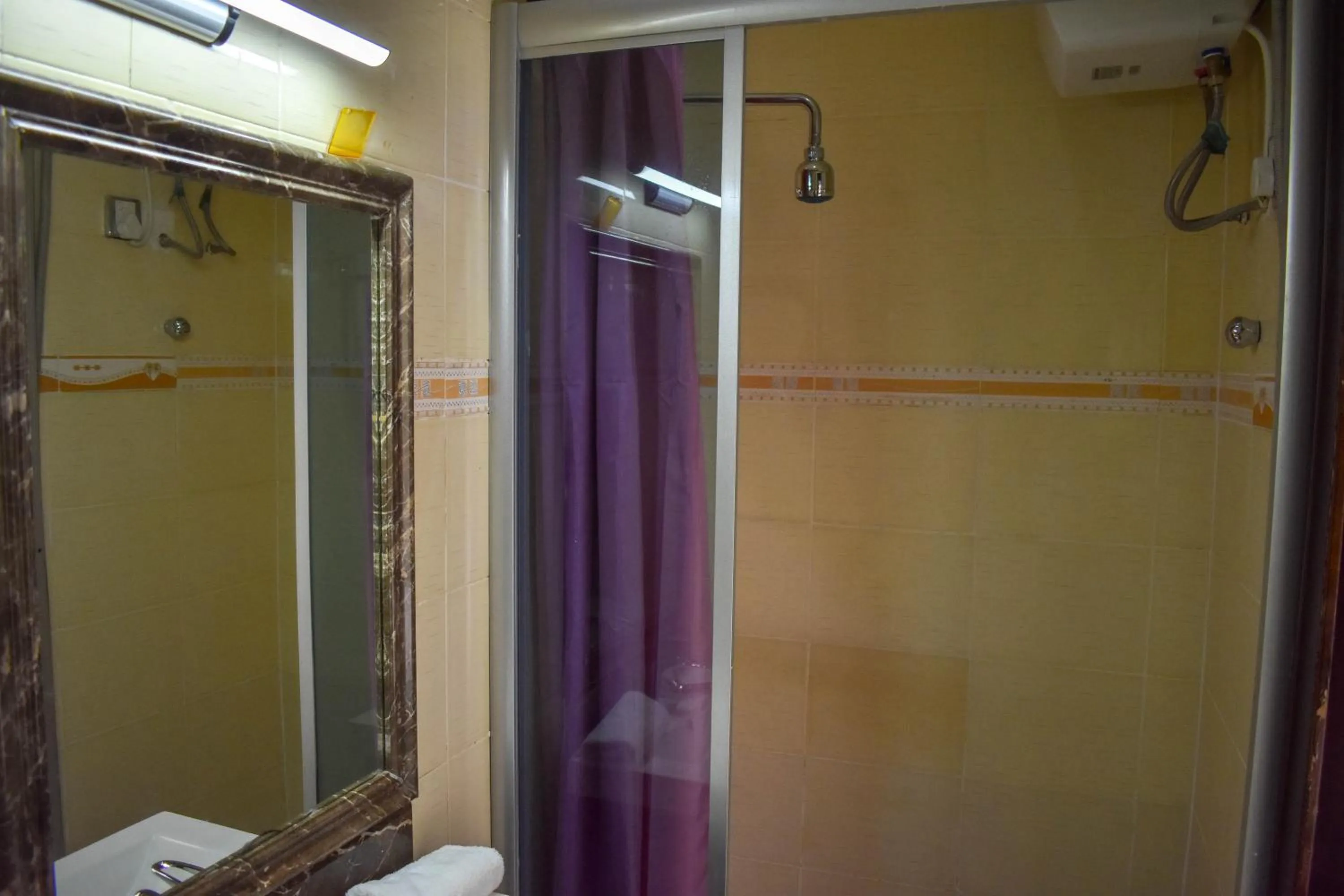 Bathroom in Sonia Hotel