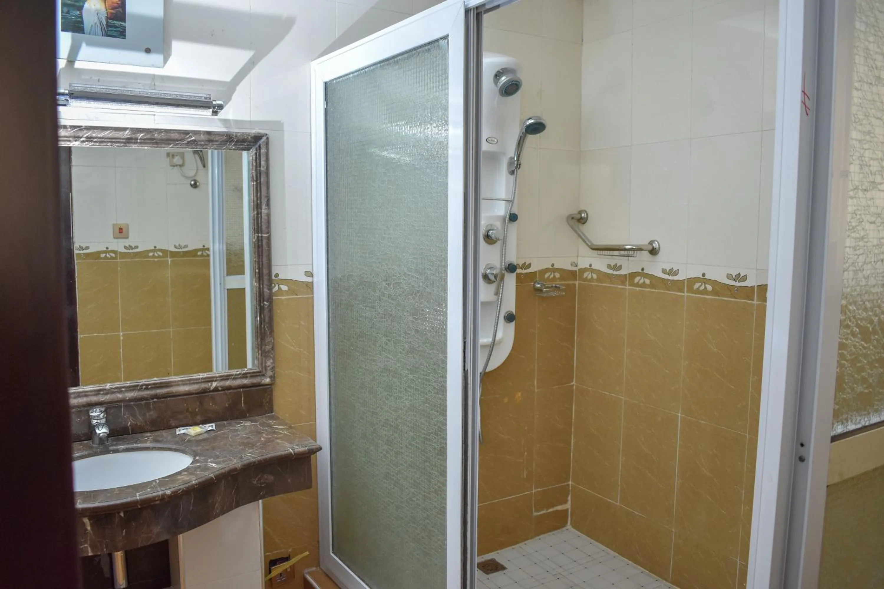 Bathroom in Sonia Hotel