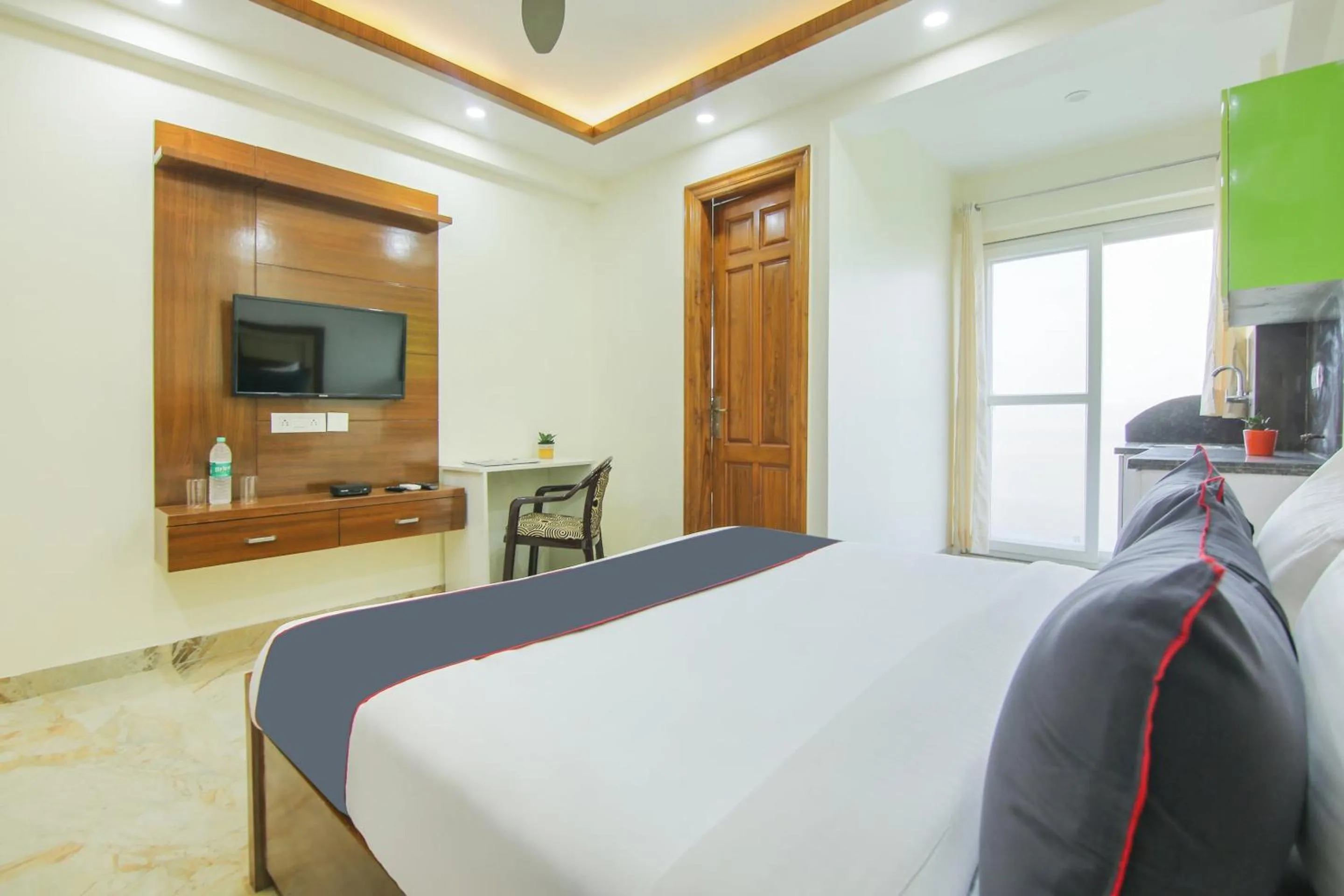 Bedroom, Bed in Collection O Corporate Suite Near Omaxe Celebration Mall