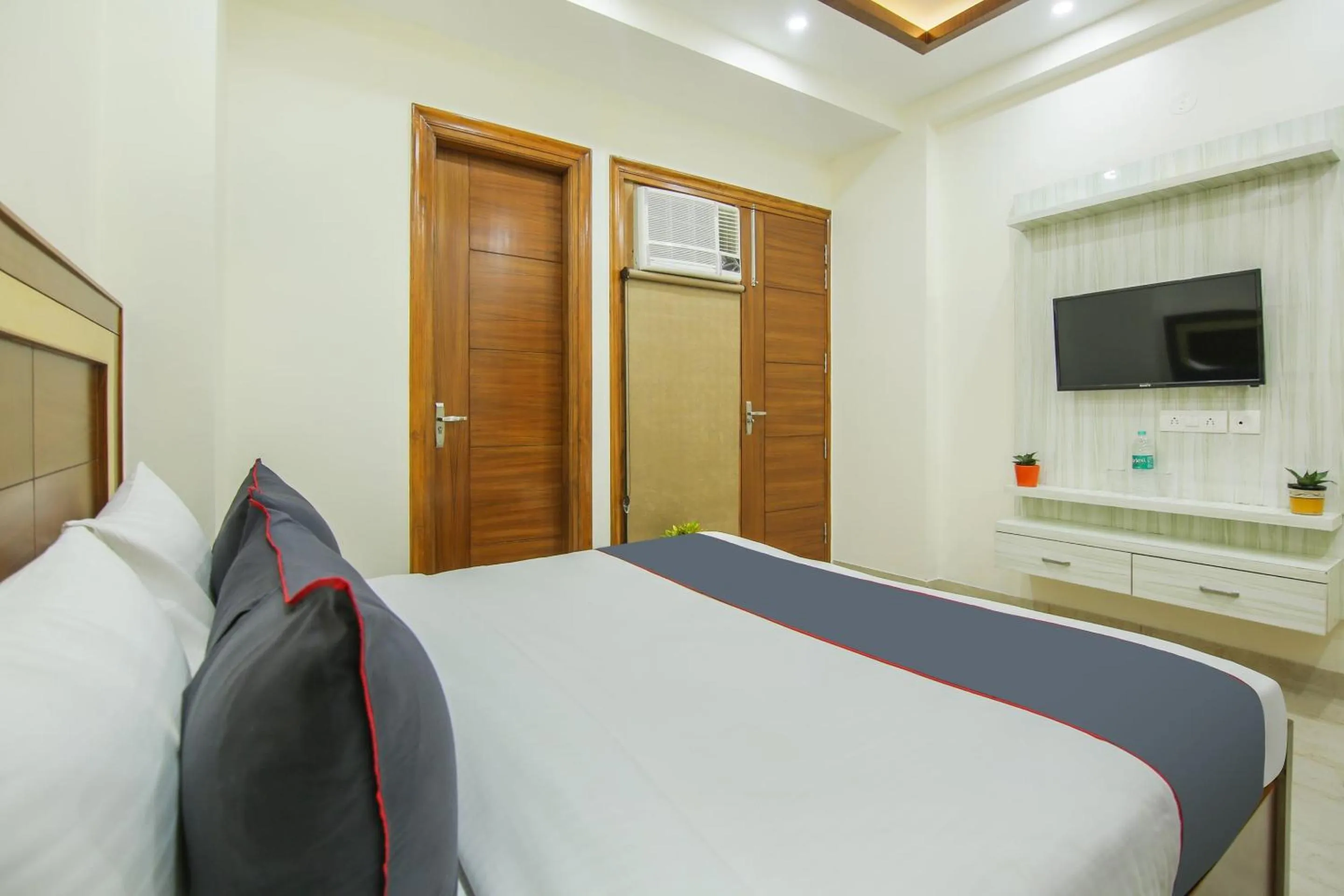 Bedroom, Bed in Collection O Corporate Suite Near Omaxe Celebration Mall