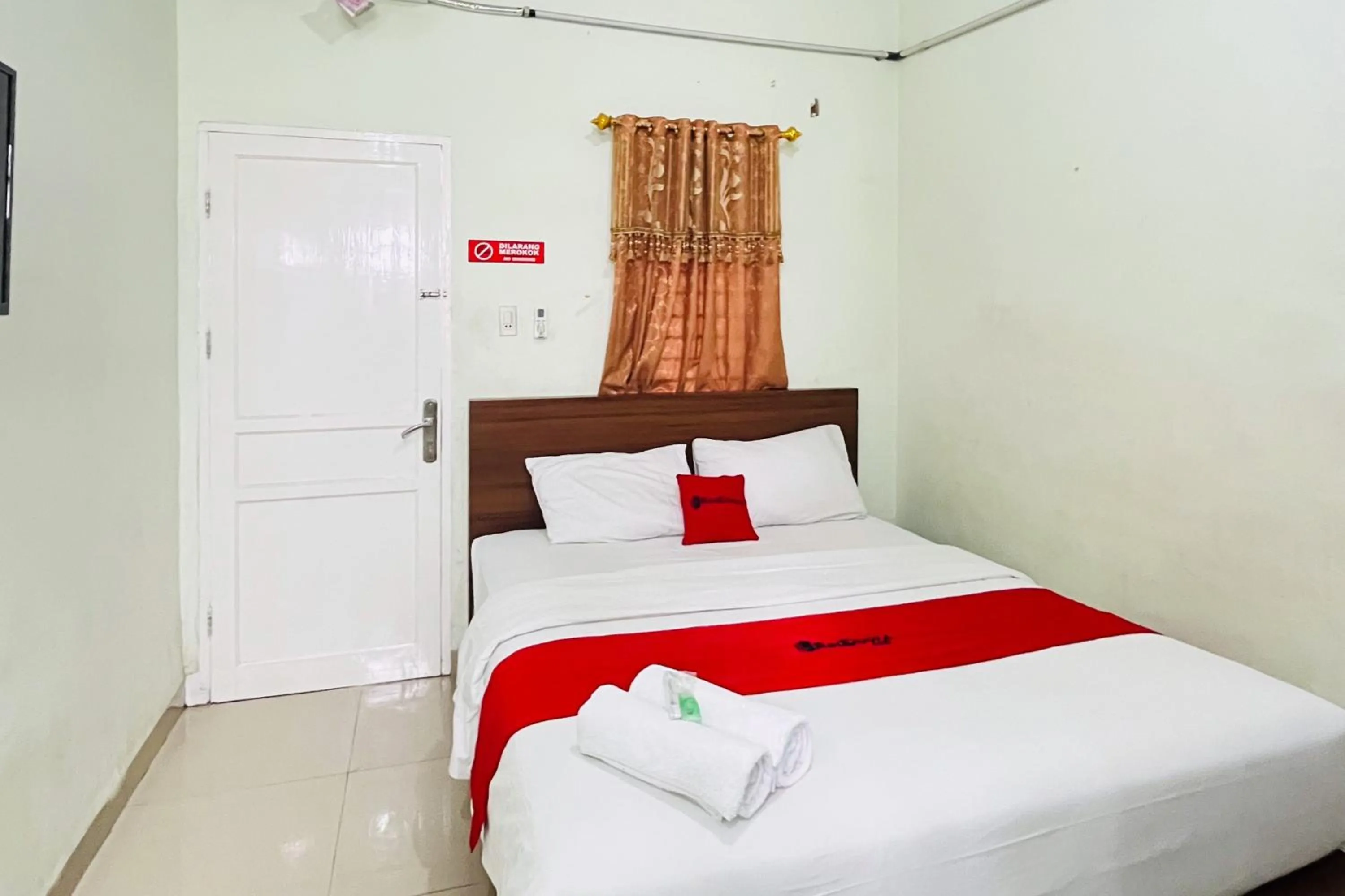 Bed in RedDoorz At Teratai Homestay Medan Amplas
