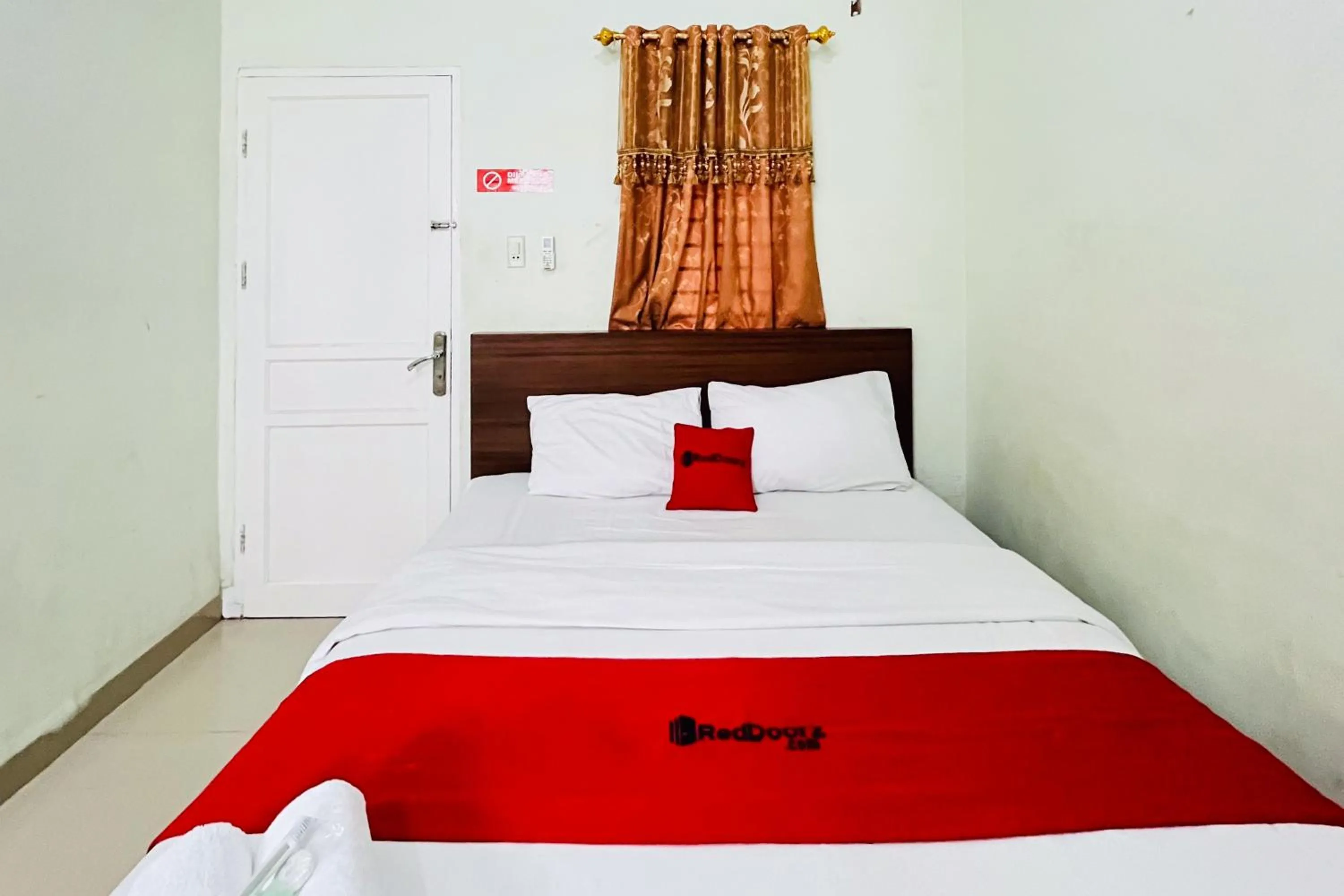 Bed in RedDoorz At Teratai Homestay Medan Amplas