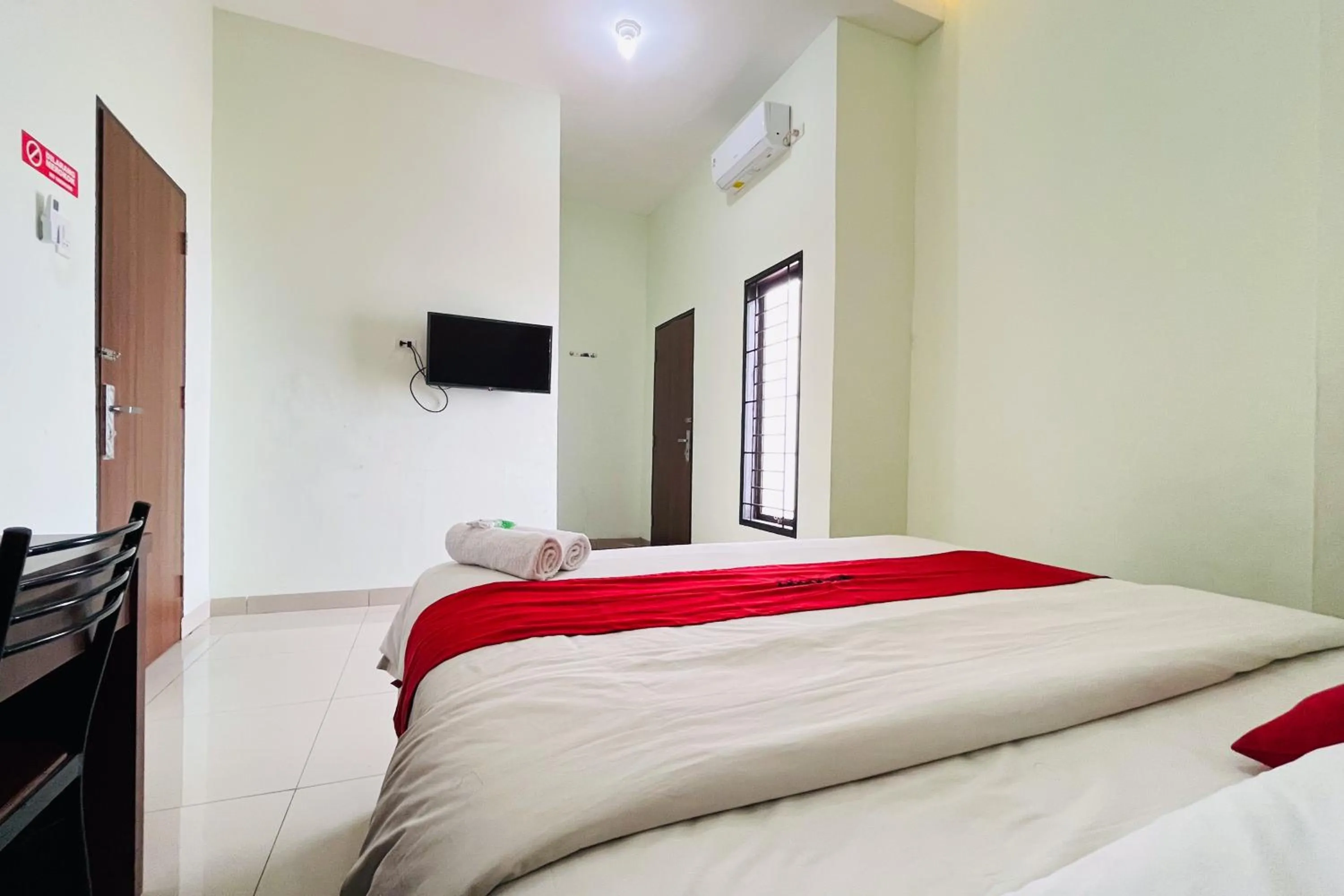 Bed in RedDoorz At Teratai Homestay Medan Amplas