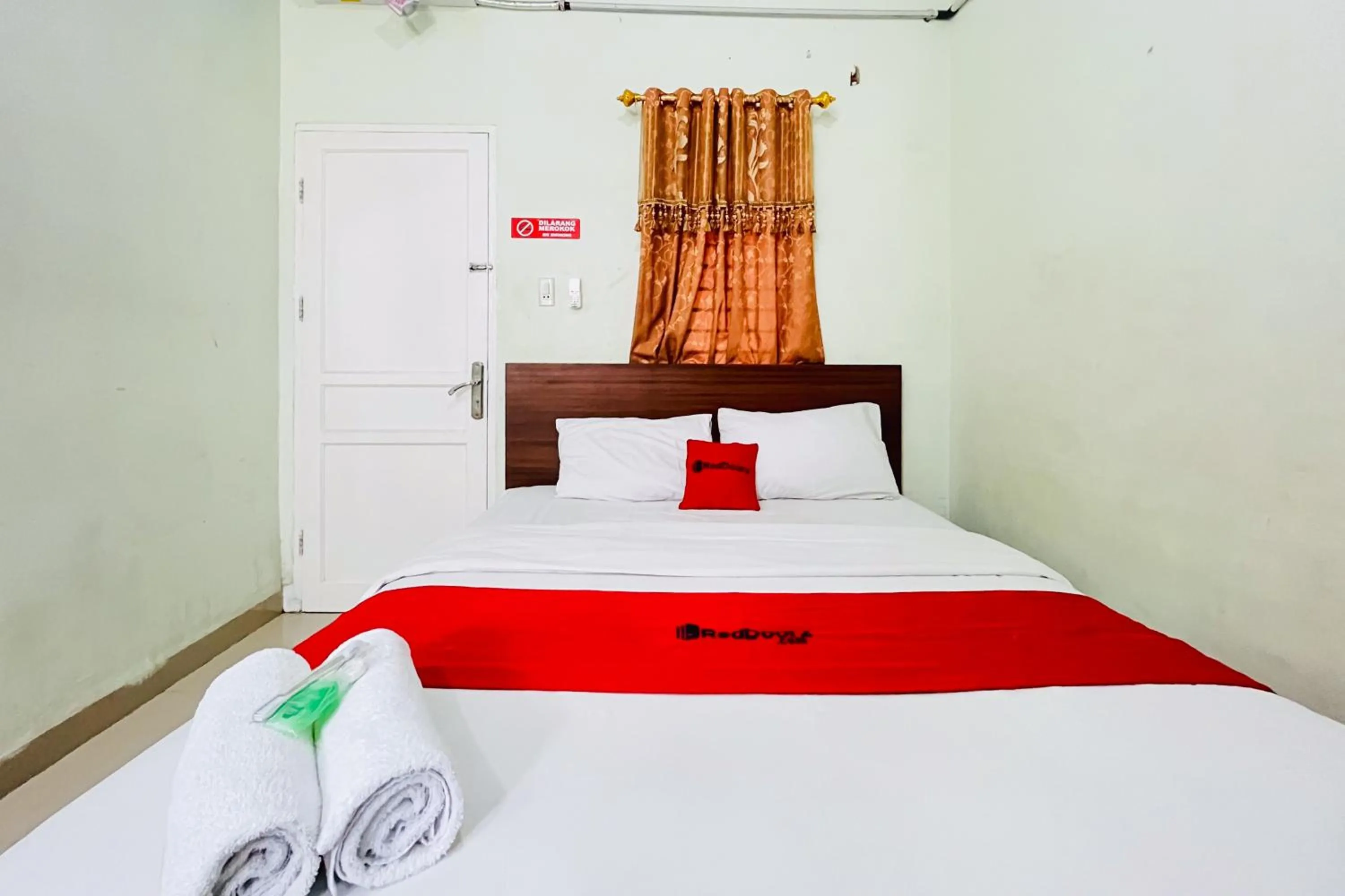 Bed in RedDoorz At Teratai Homestay Medan Amplas