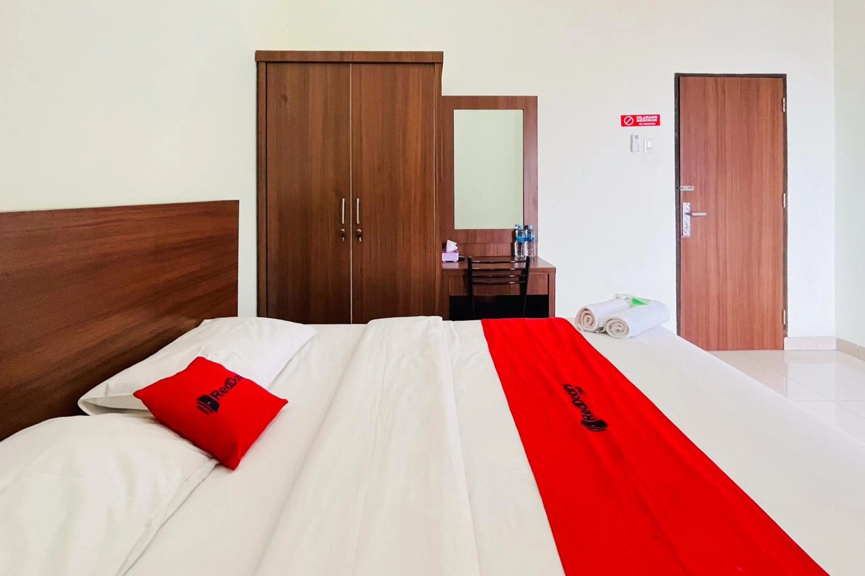 Bed in RedDoorz At Teratai Homestay Medan Amplas