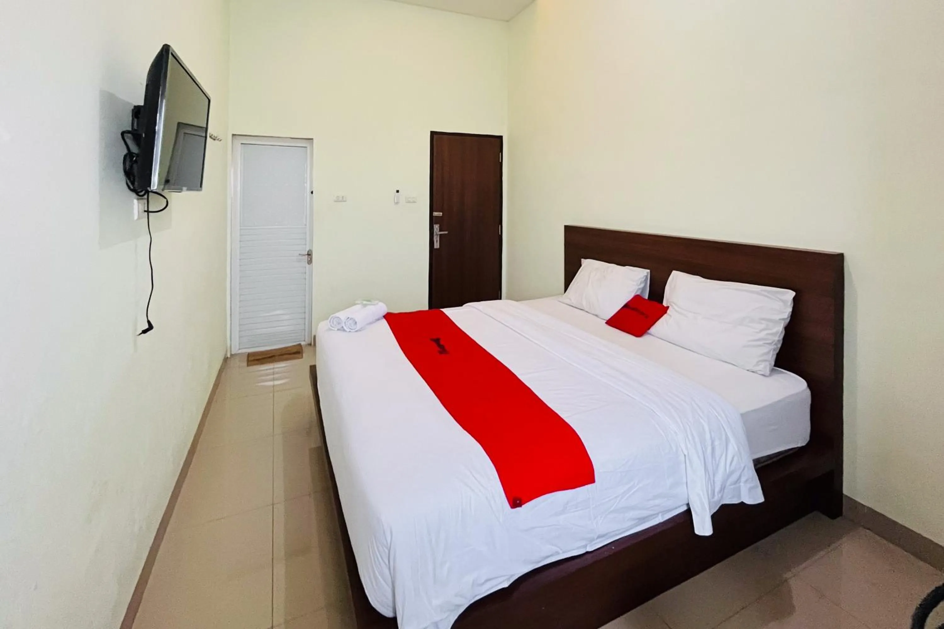 Bed in RedDoorz At Teratai Homestay Medan Amplas