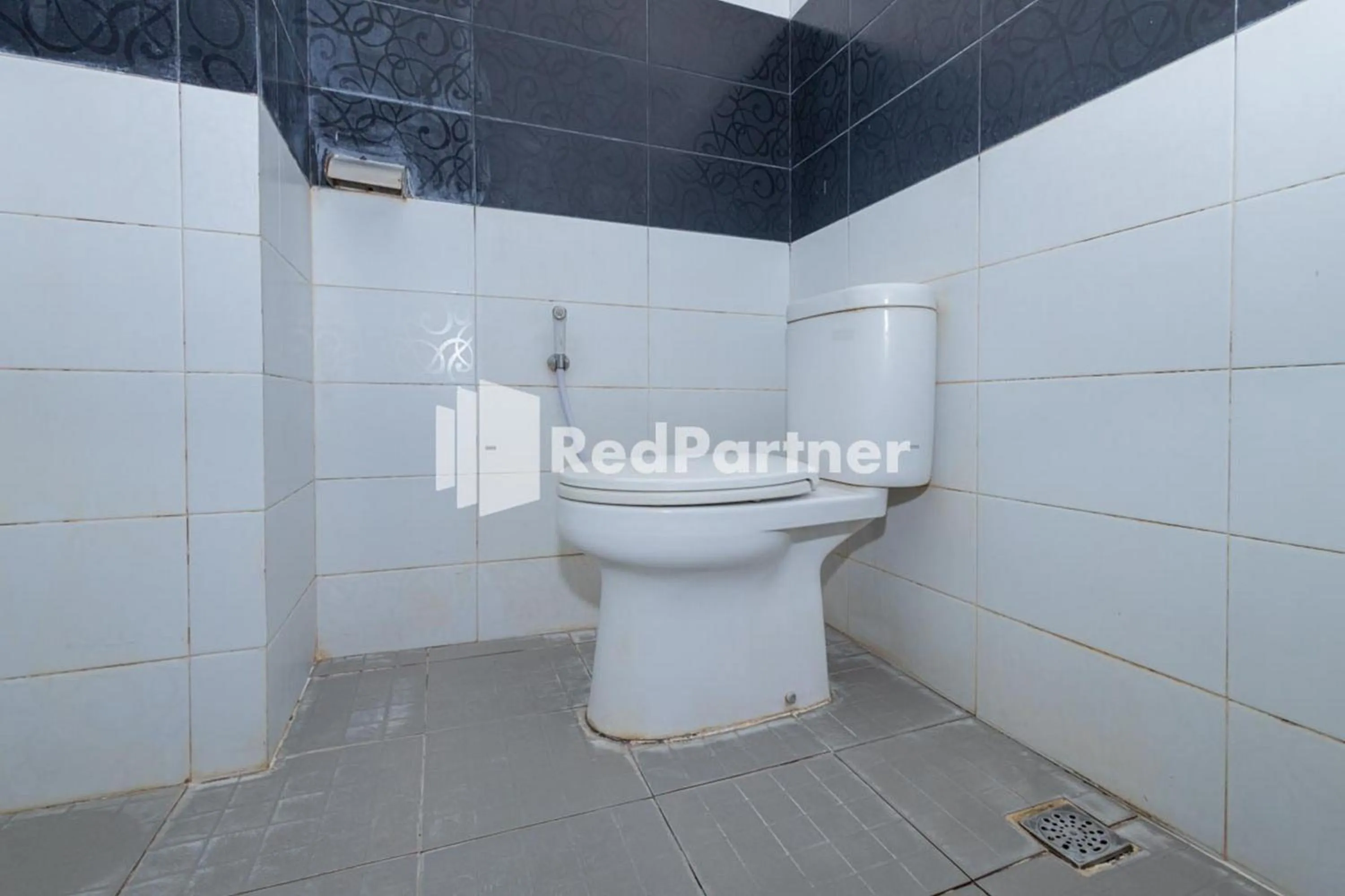 Toilet in Star Hotel Jaksa Mitra RedDoorz