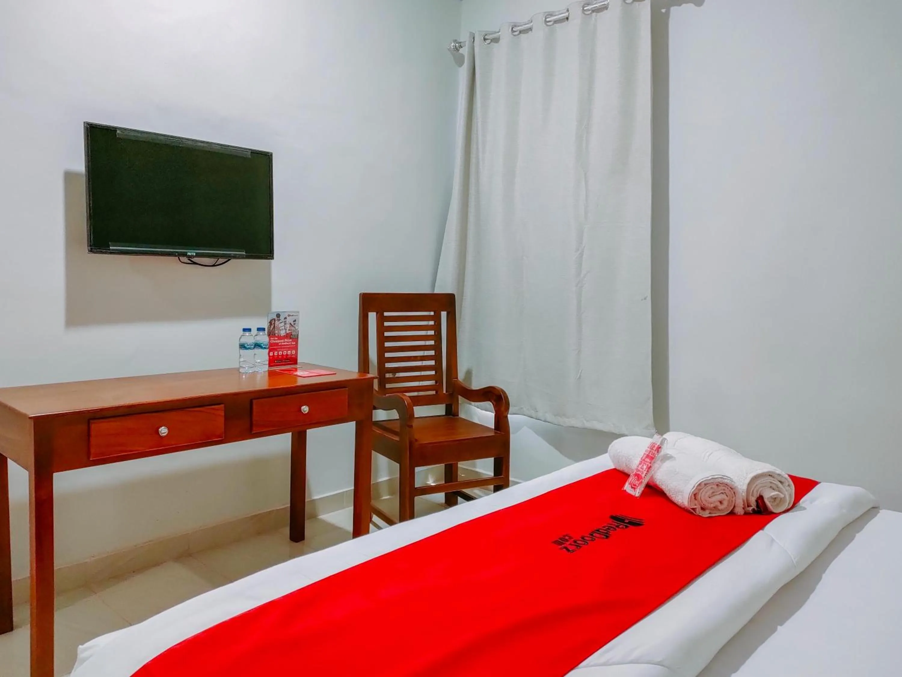 Bed in RedDoorz at Omah Candi Sari near Airport YIA