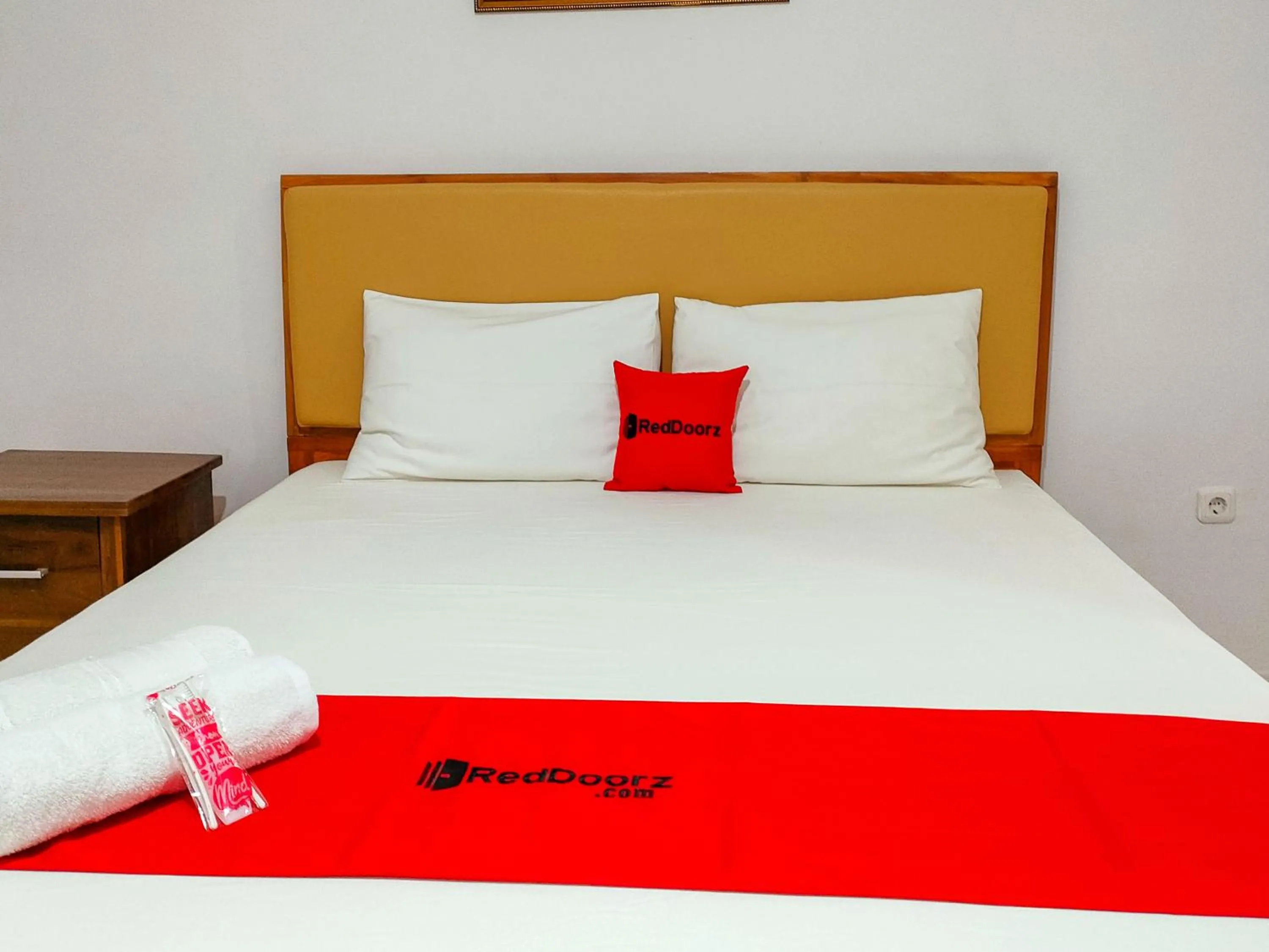 Bed in RedDoorz at Omah Candi Sari near Airport YIA