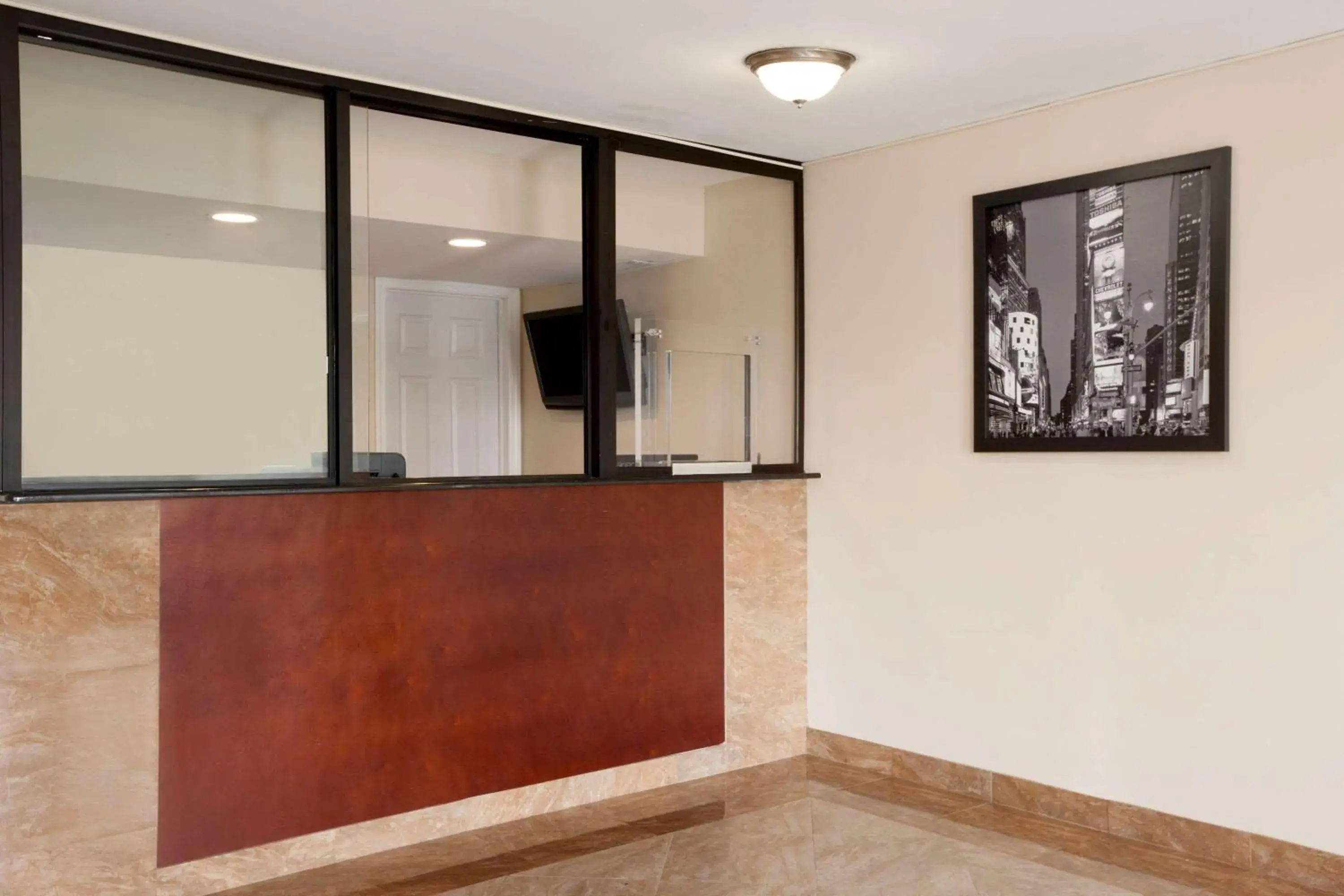 Lobby or reception in Super 8 by Wyndham Rahway/Newark Lobby or reception in Super 8 by Wyndham Rahway/Newark