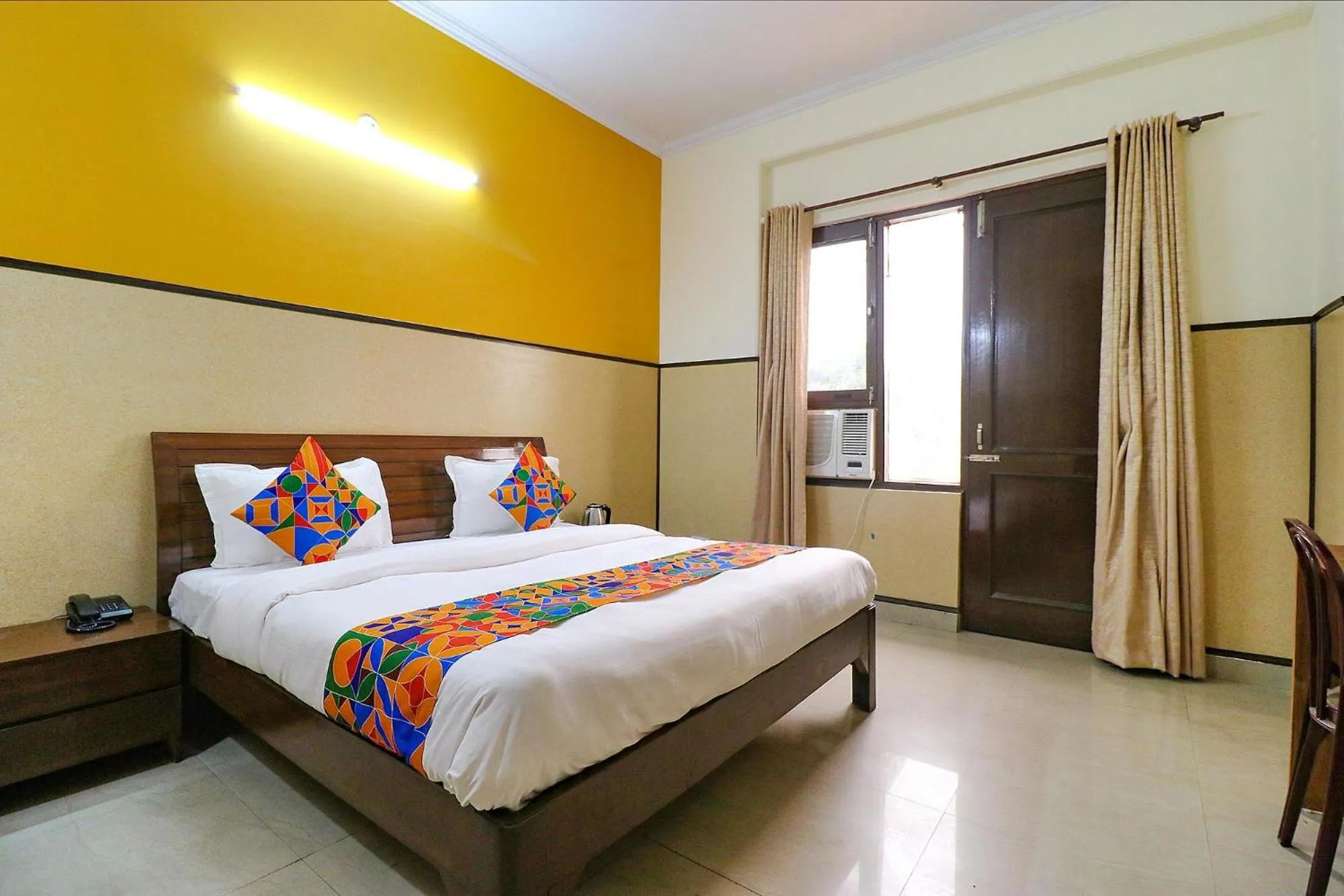 Bed in FabHotel Elite Peak