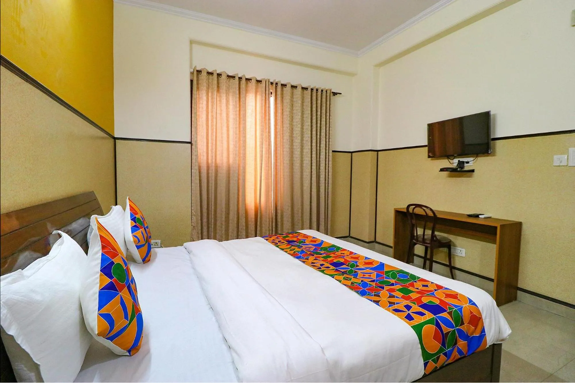 Bed in FabHotel Elite Peak