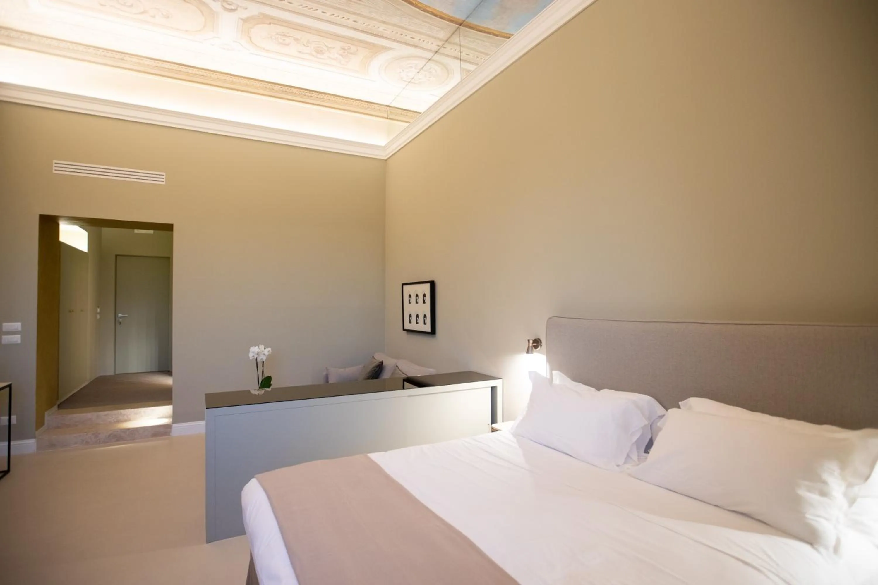 Bed in Domus 21 Luxury Suites