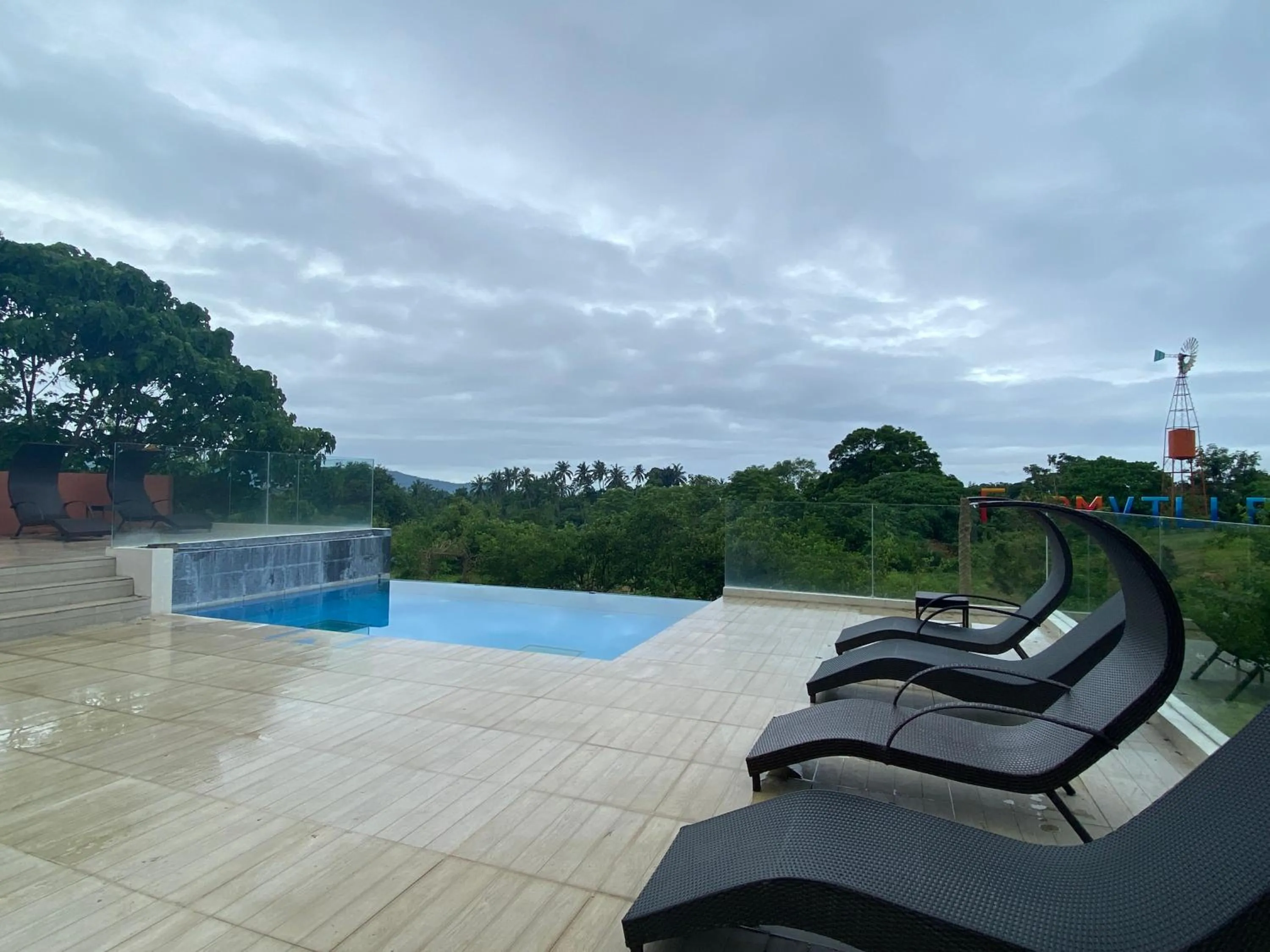 Swimming pool in Taal Maranan Farmville Inc by Cocotel