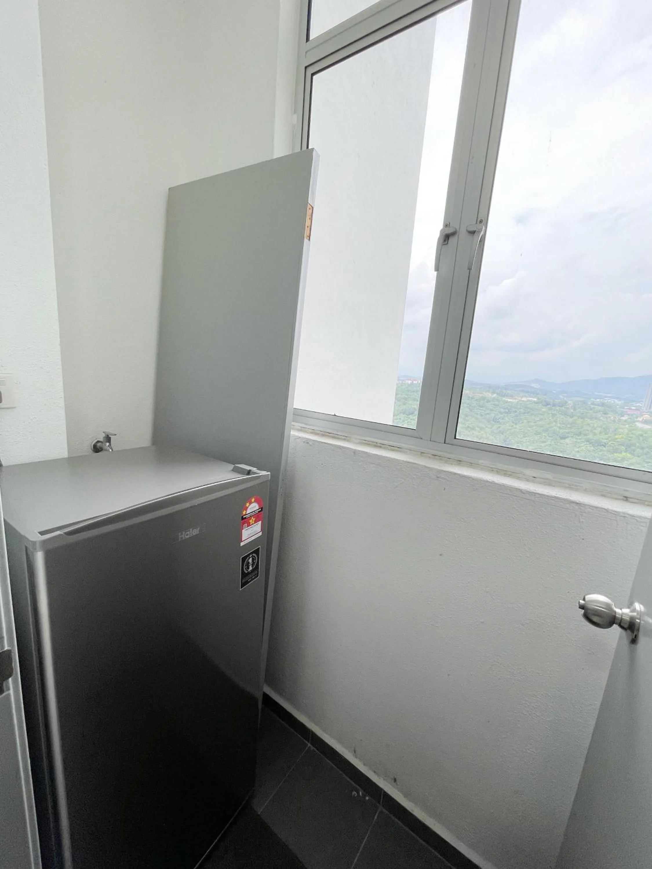 Kitchen or kitchenette in MesaHill Homestay, Nilai by S&T Homez