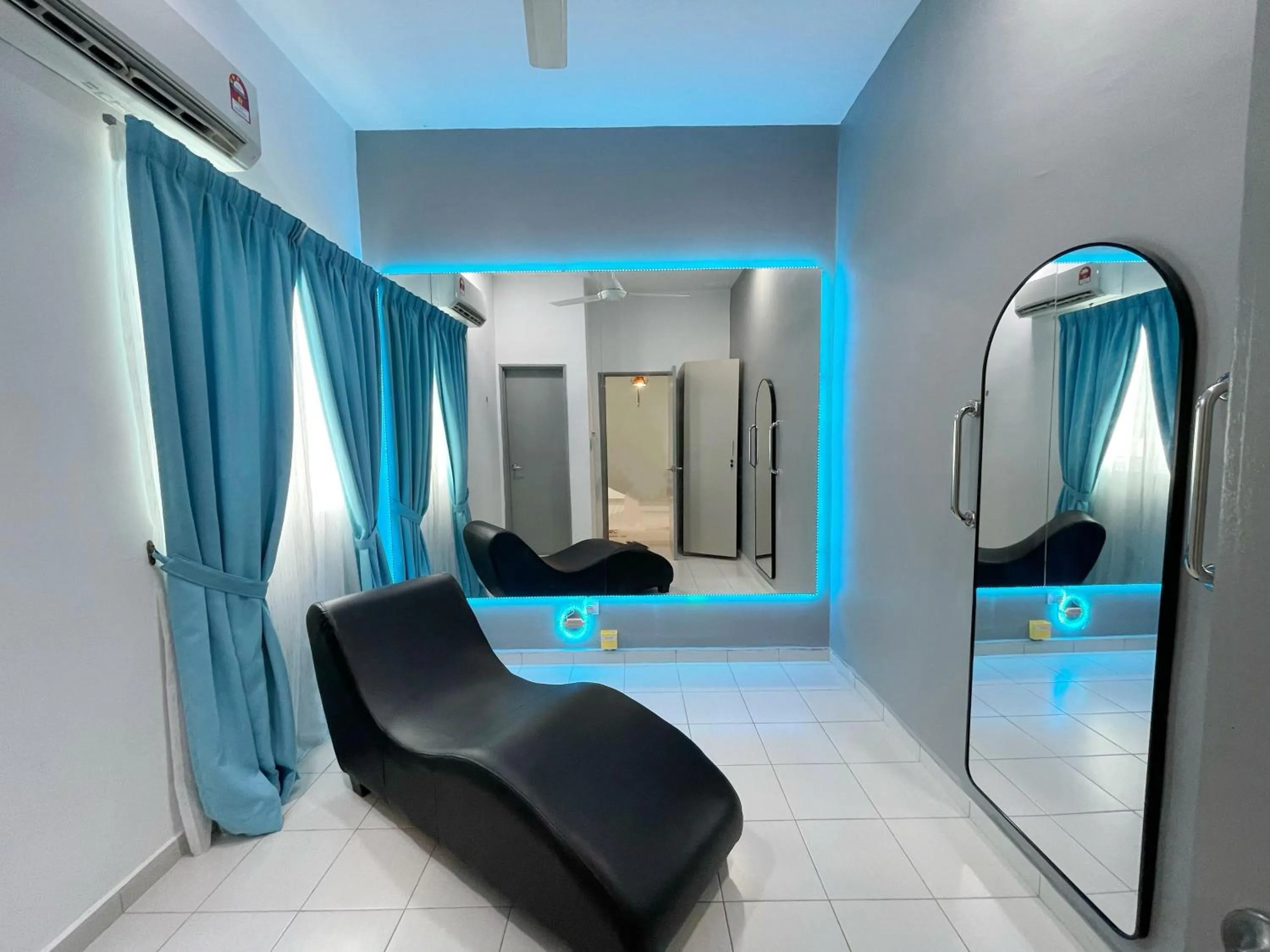 Seating area, Bed in MesaHill Homestay, Nilai by S&T Homez