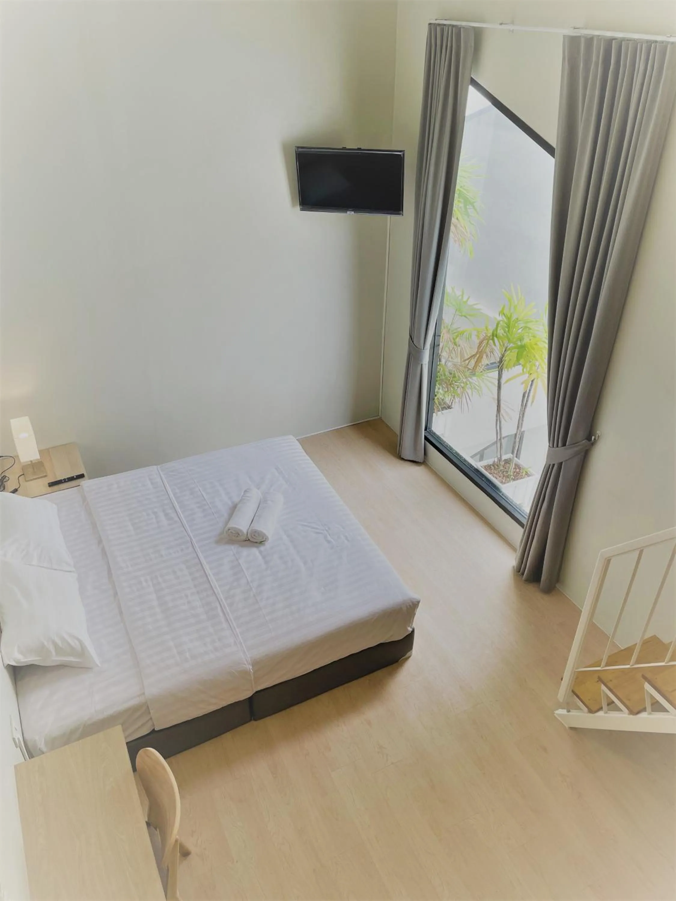 Bed in THE BELONG BOUTIQUE HOTEL