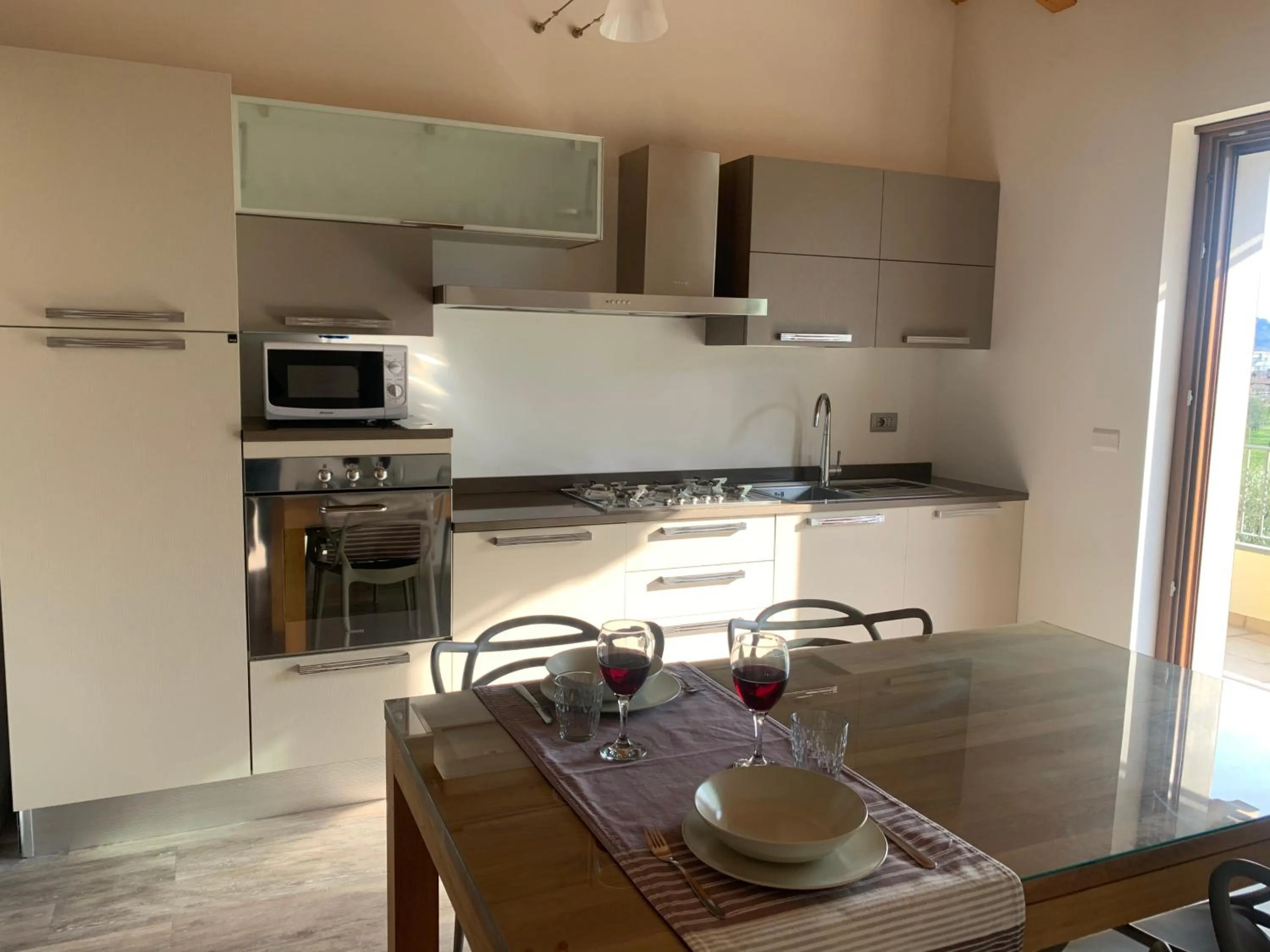 Kitchen or kitchenette in Arcovacanze