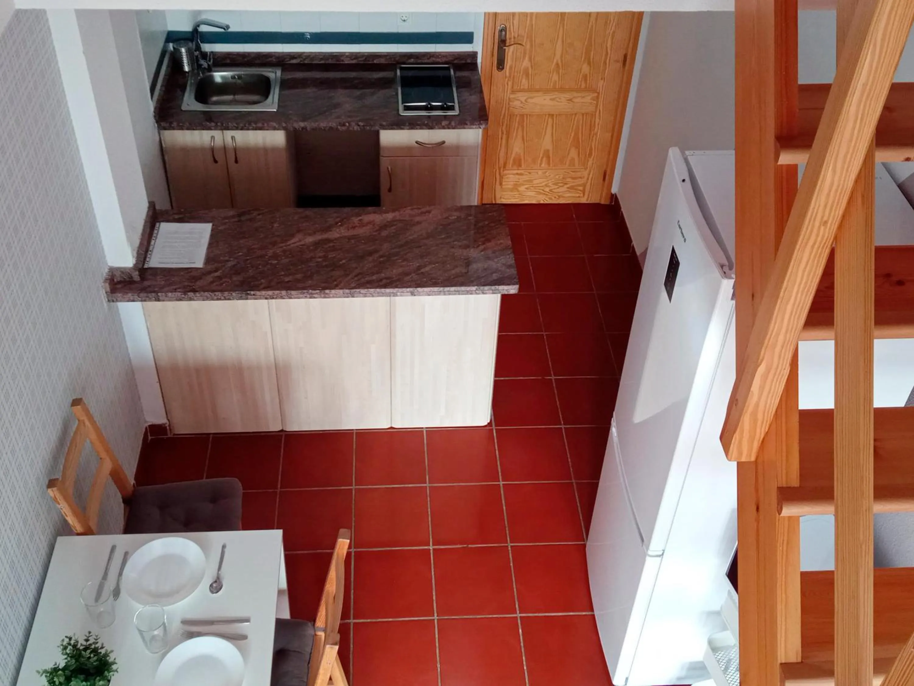 Kitchen or kitchenette in Apartamentos Sierra Nevada 3000