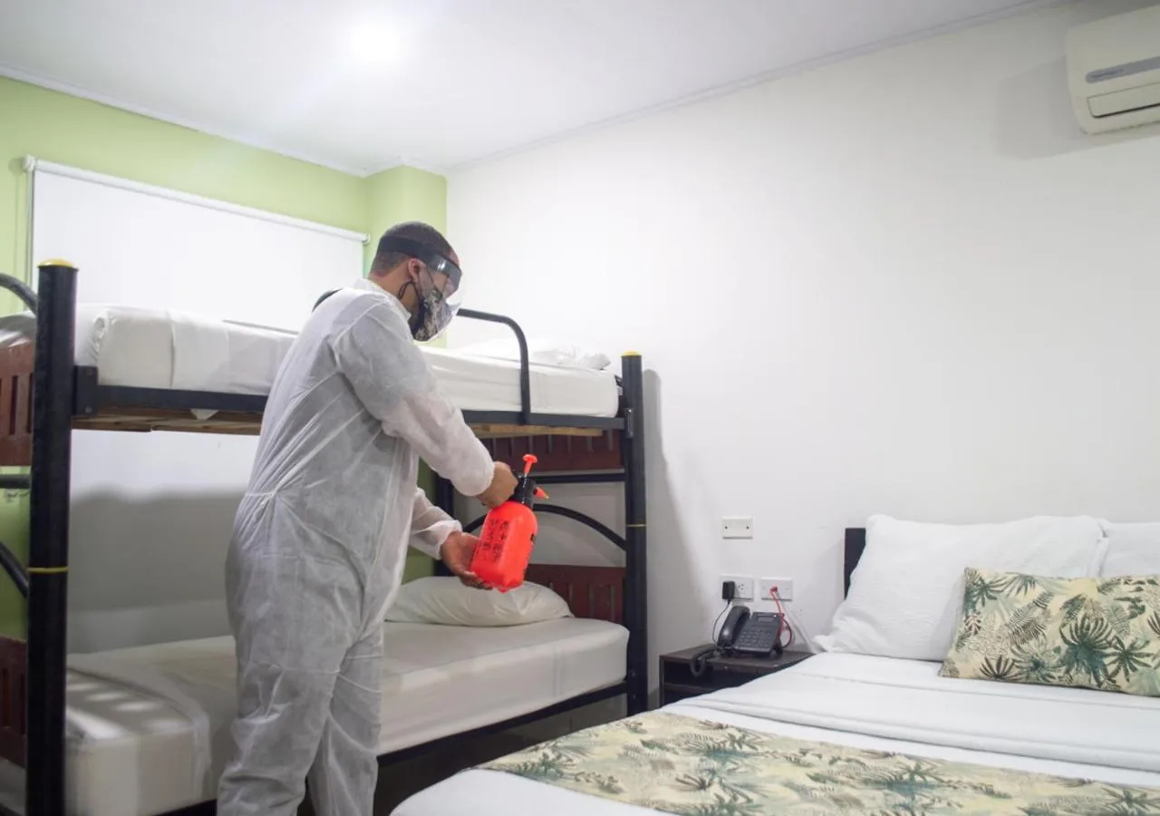 Staff, Bed in Hotel Marina Suites By GEH Suites