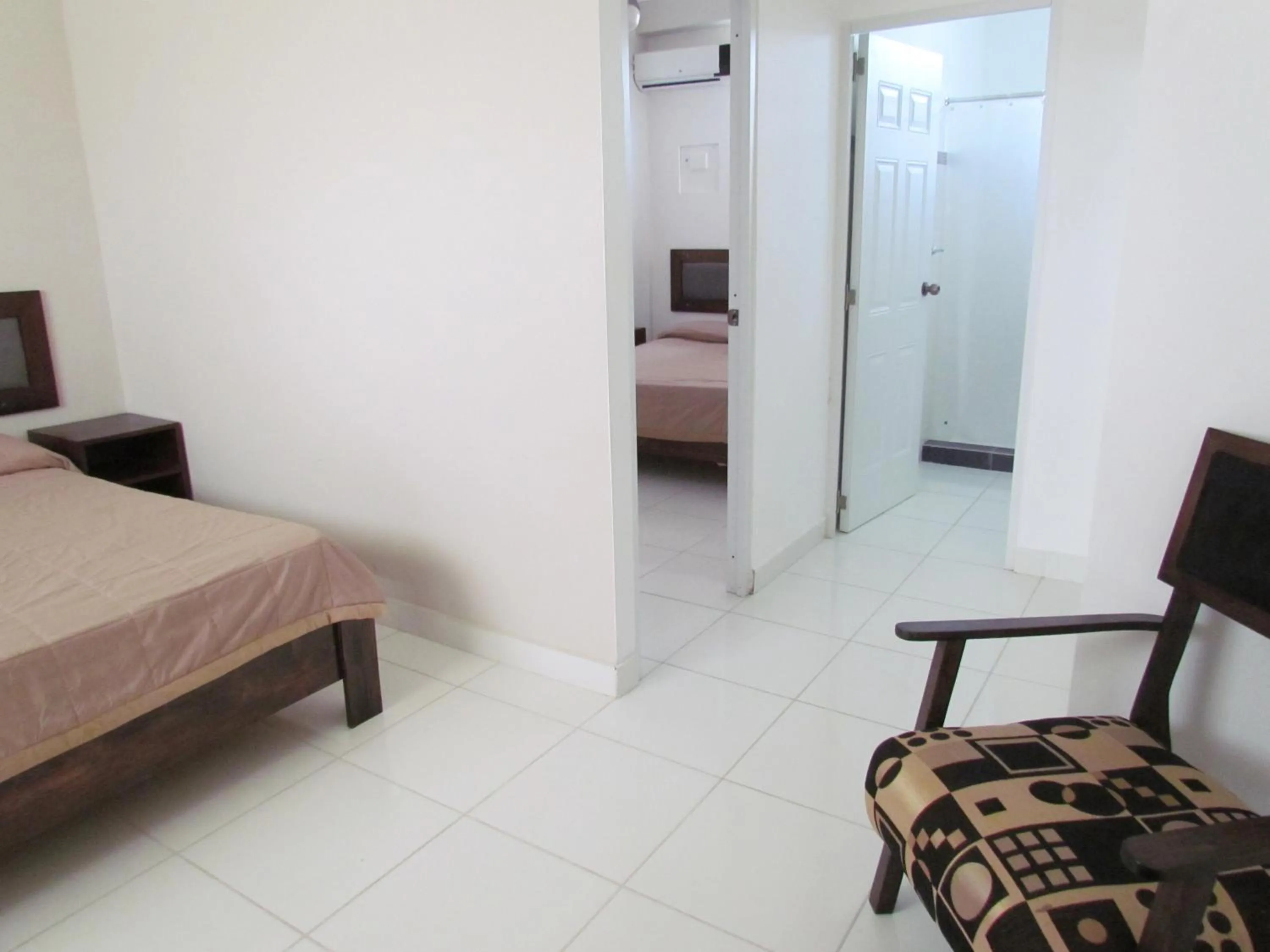 Photo of the whole room, Bed in Plaza Coral Hotel