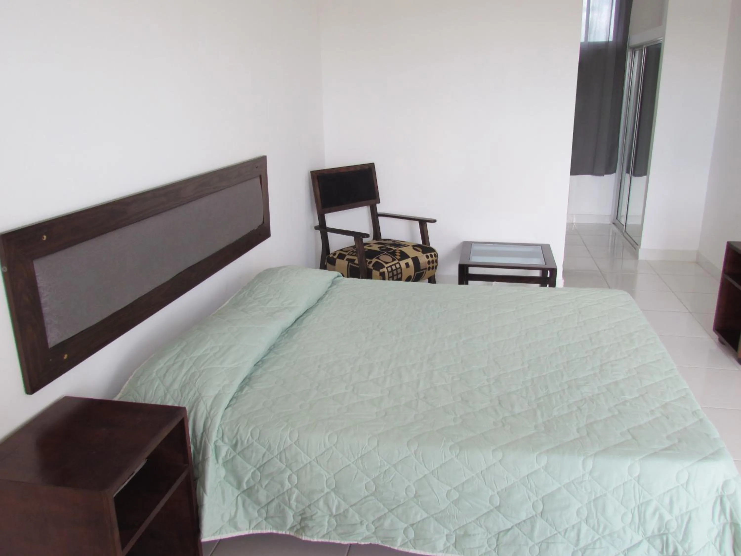 Photo of the whole room, Bed in Plaza Coral Hotel