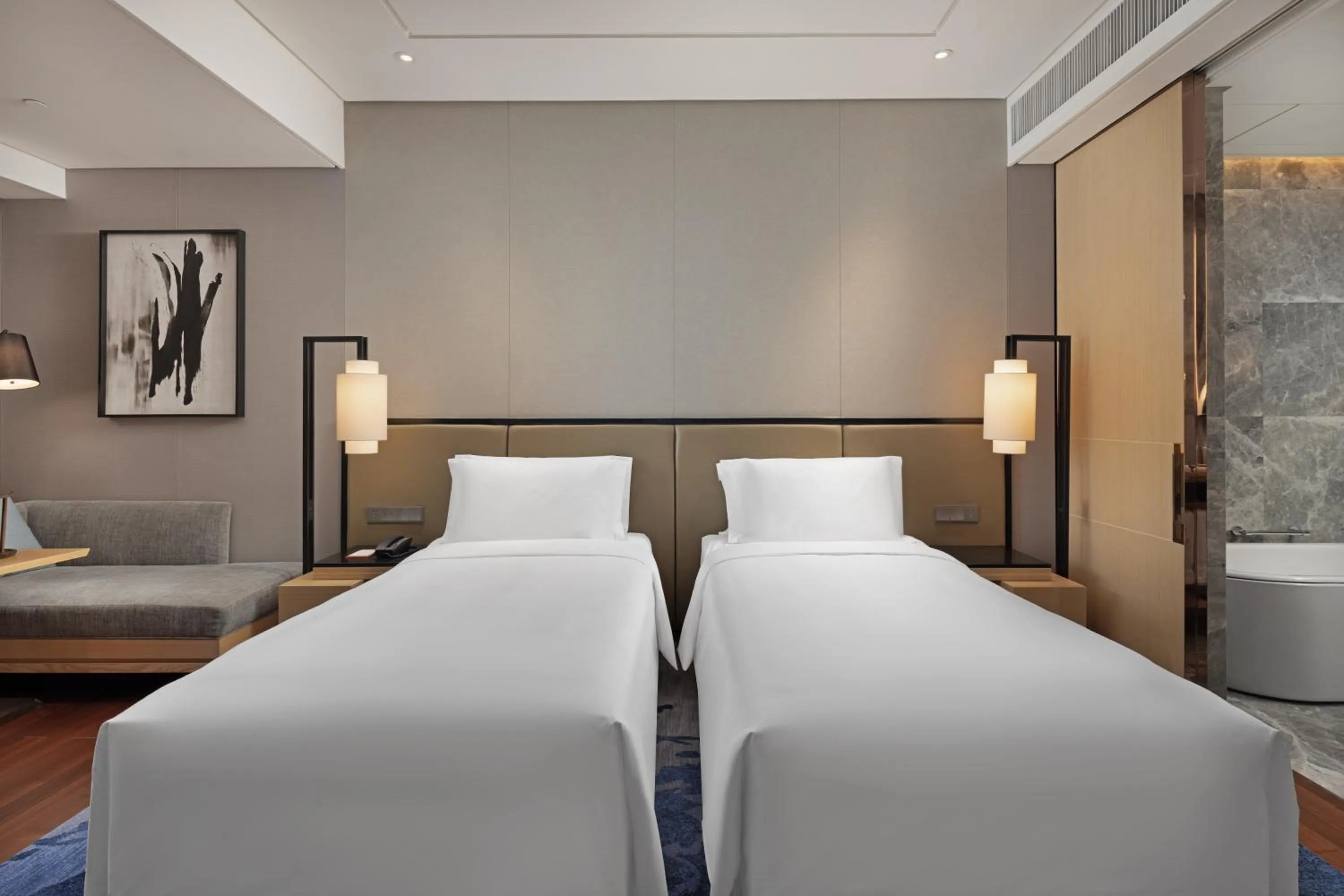 Bed in New World Beijing Hotel