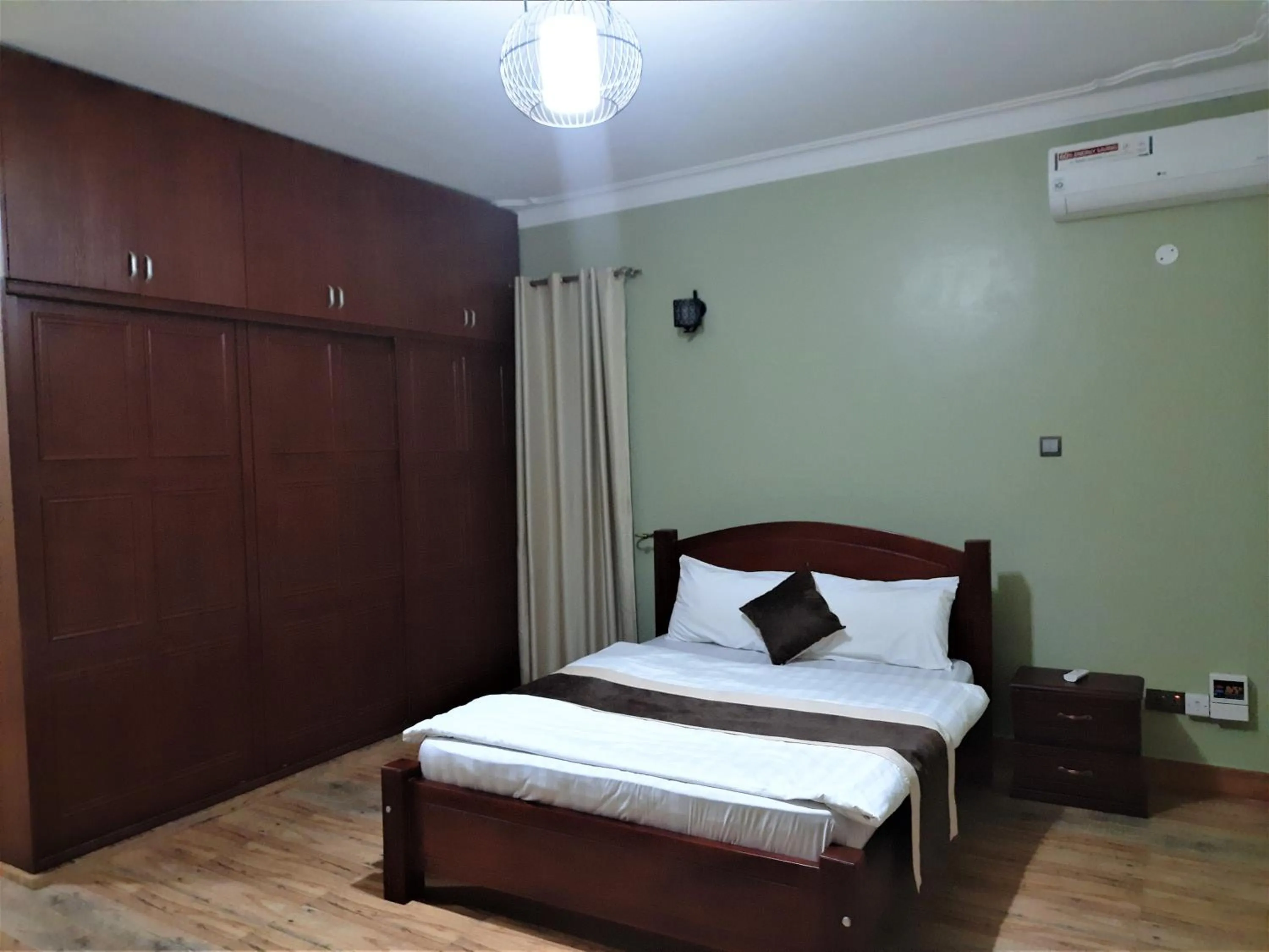 Bedroom, Bed in Munyonyo Heights Apartments