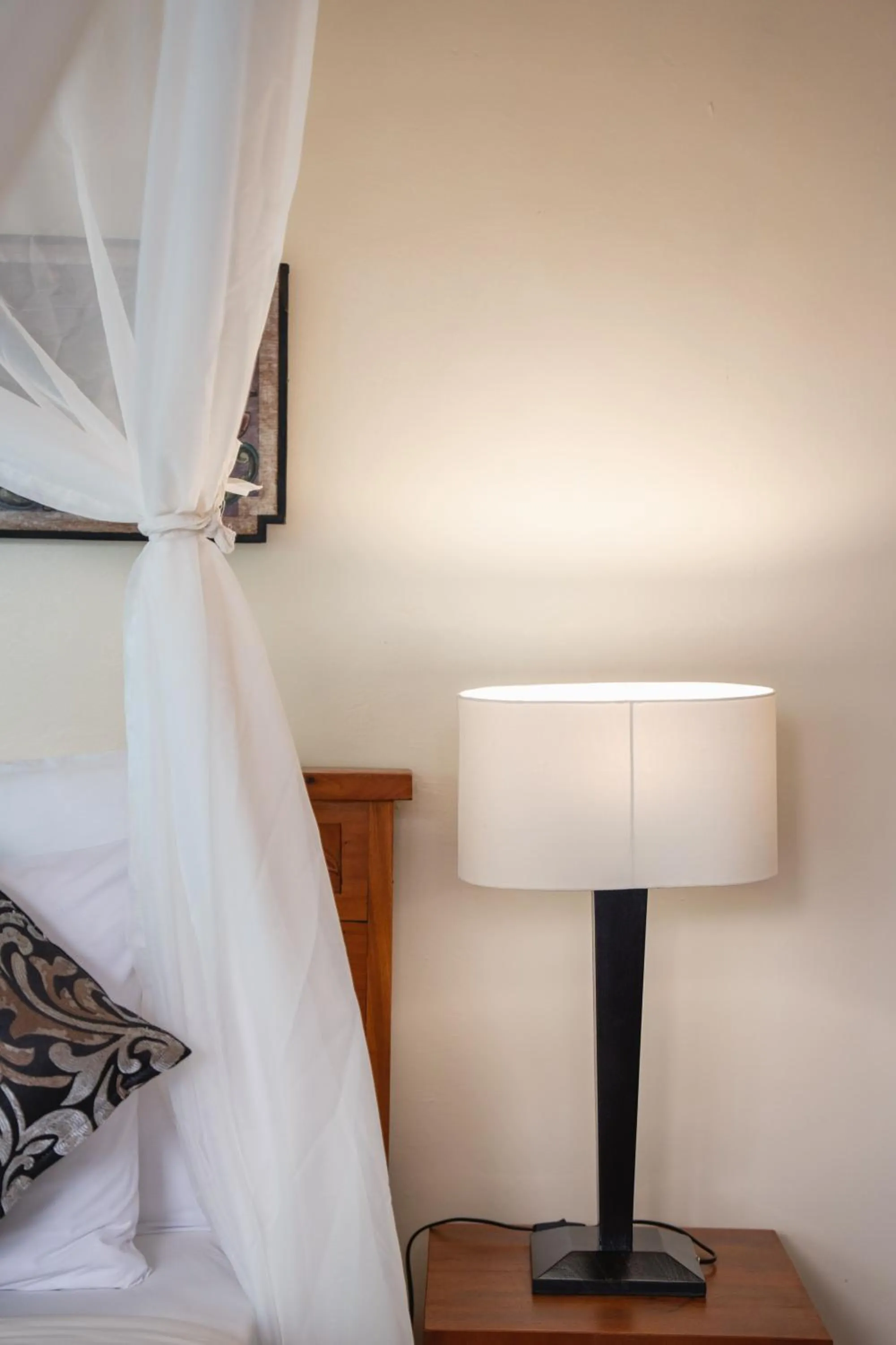 Bed in The Compass Rose Ubud