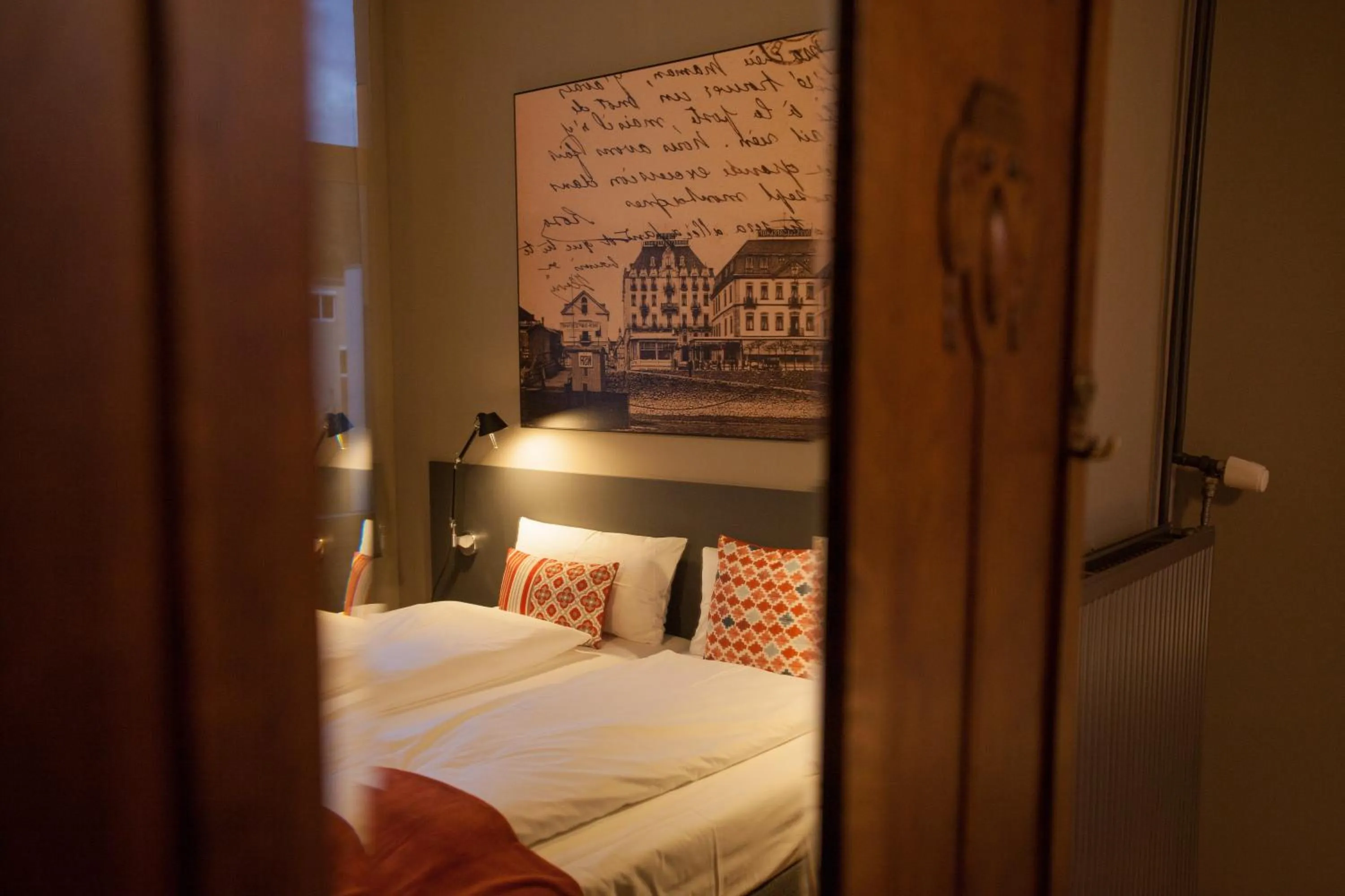 Bed in Storyhotel Bergischer Hof Königswinter