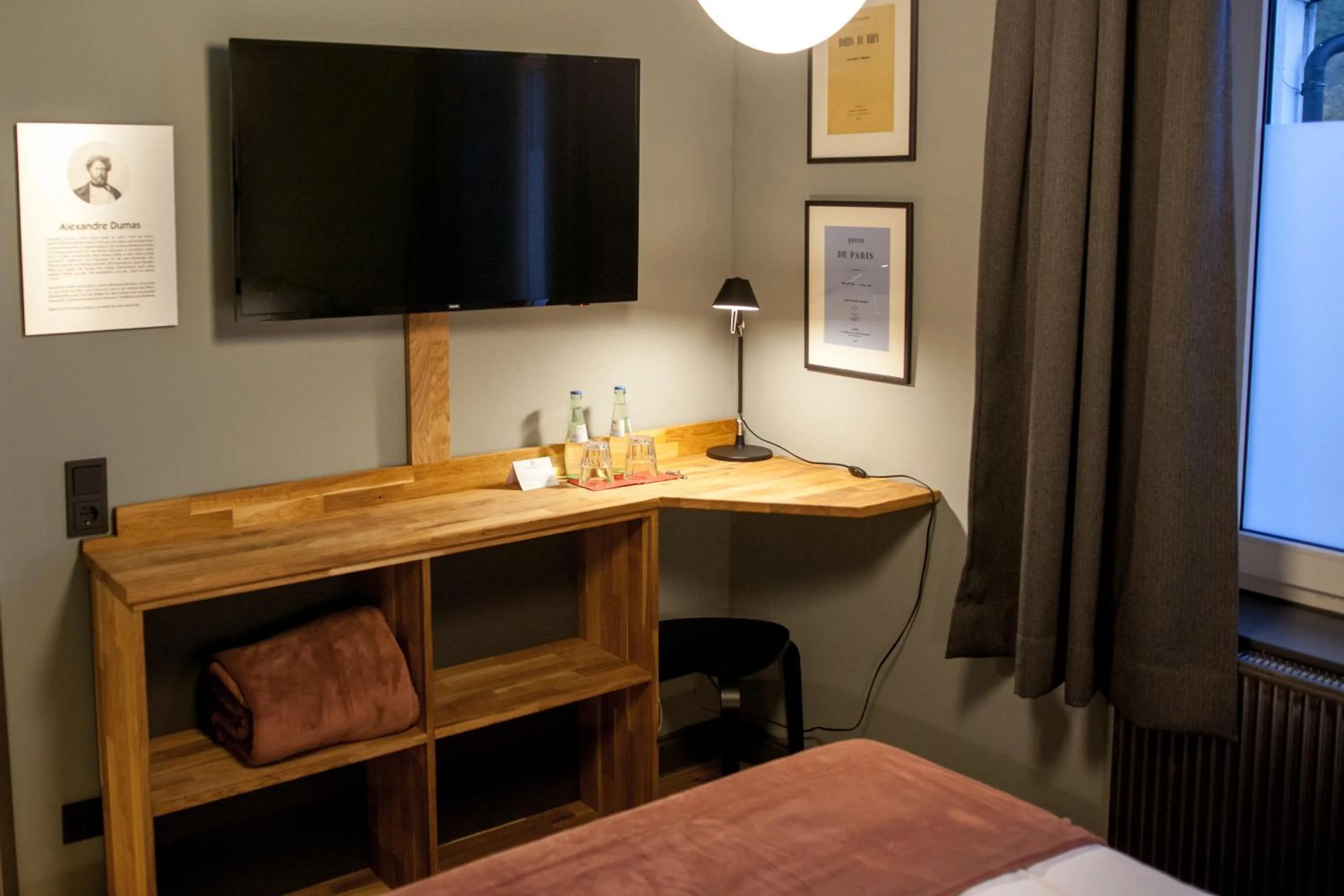 Bed in Storyhotel Bergischer Hof Königswinter