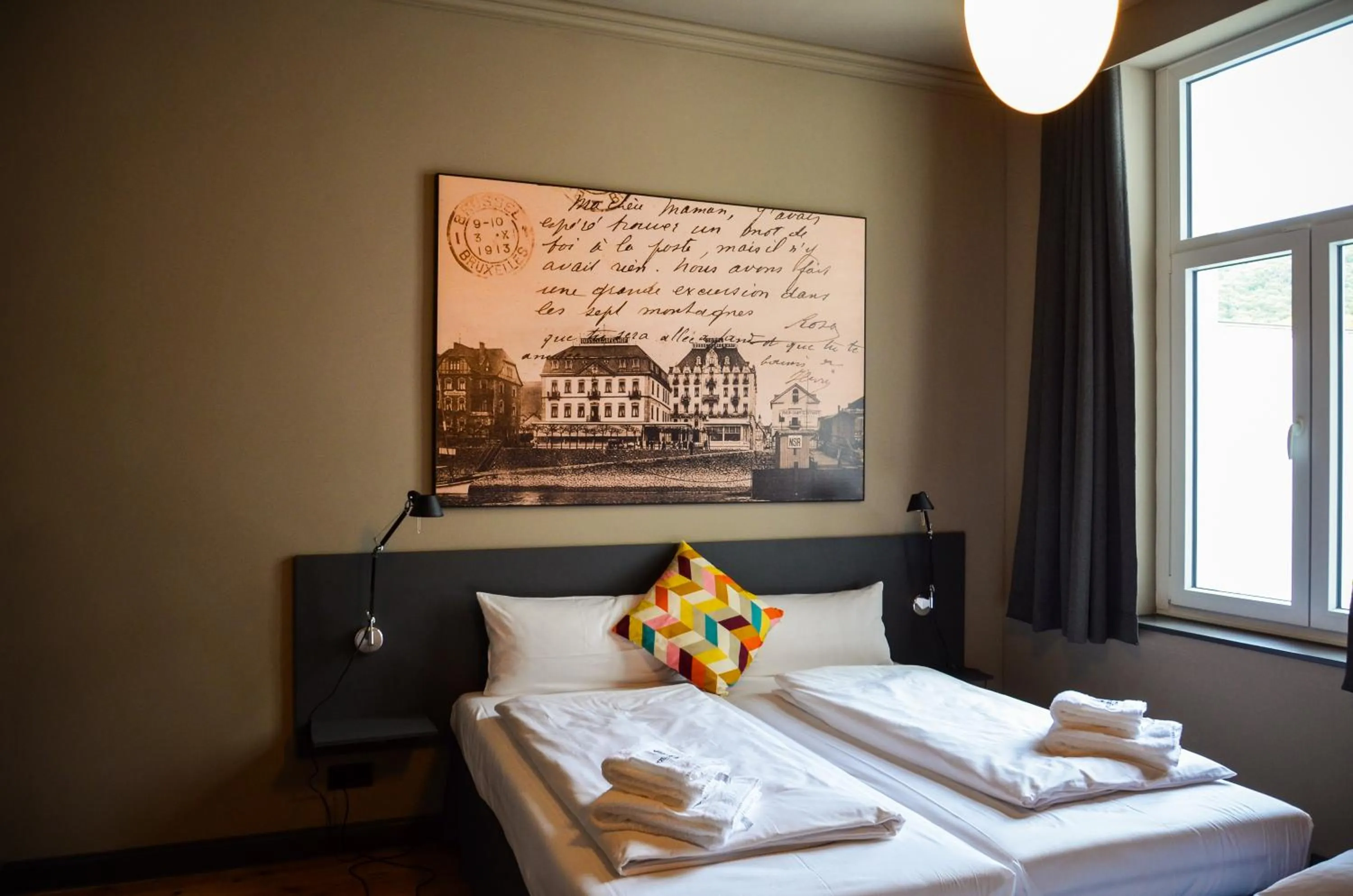 Bed in Storyhotel Bergischer Hof Königswinter