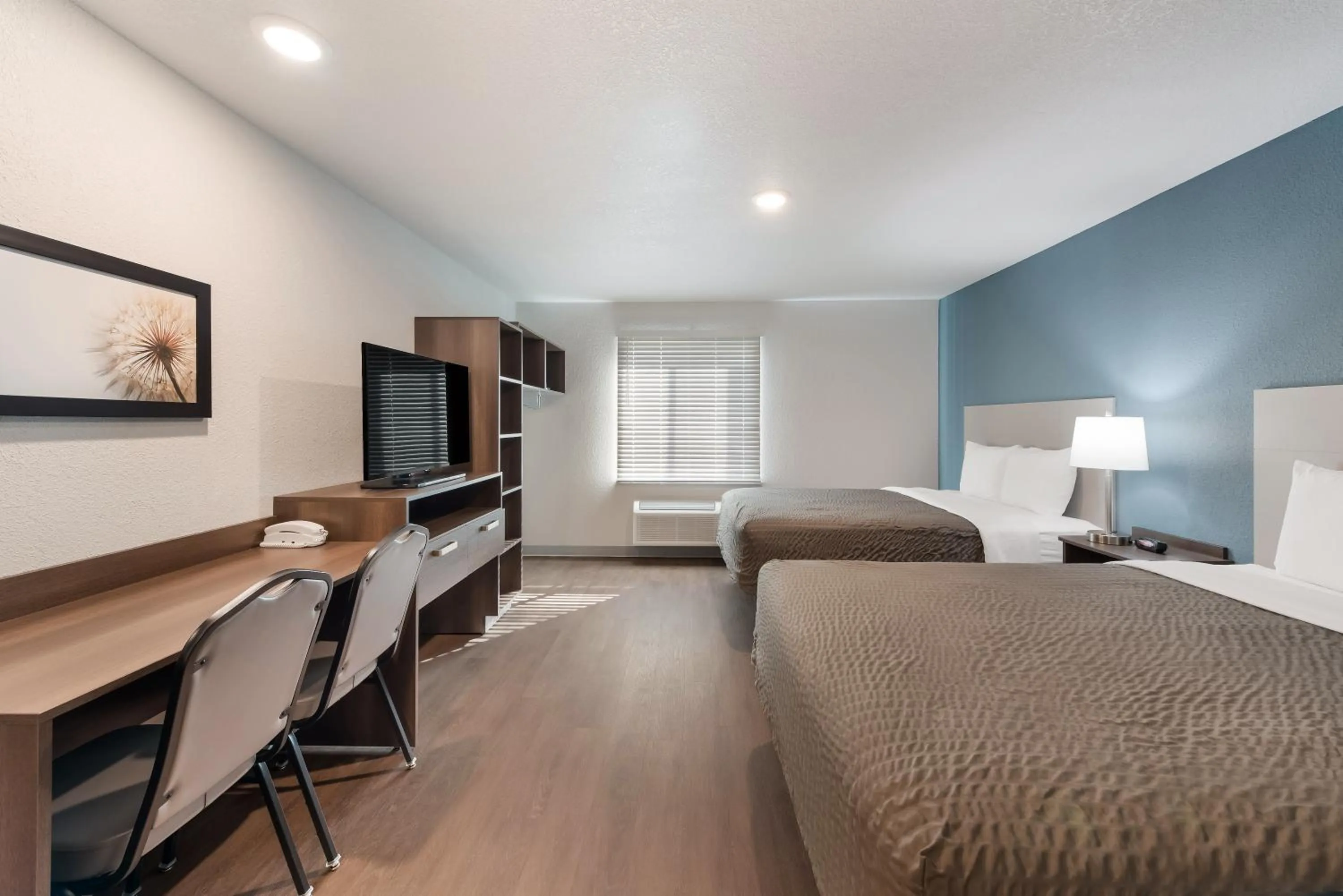 Bed in WoodSpring Suites Dayton North