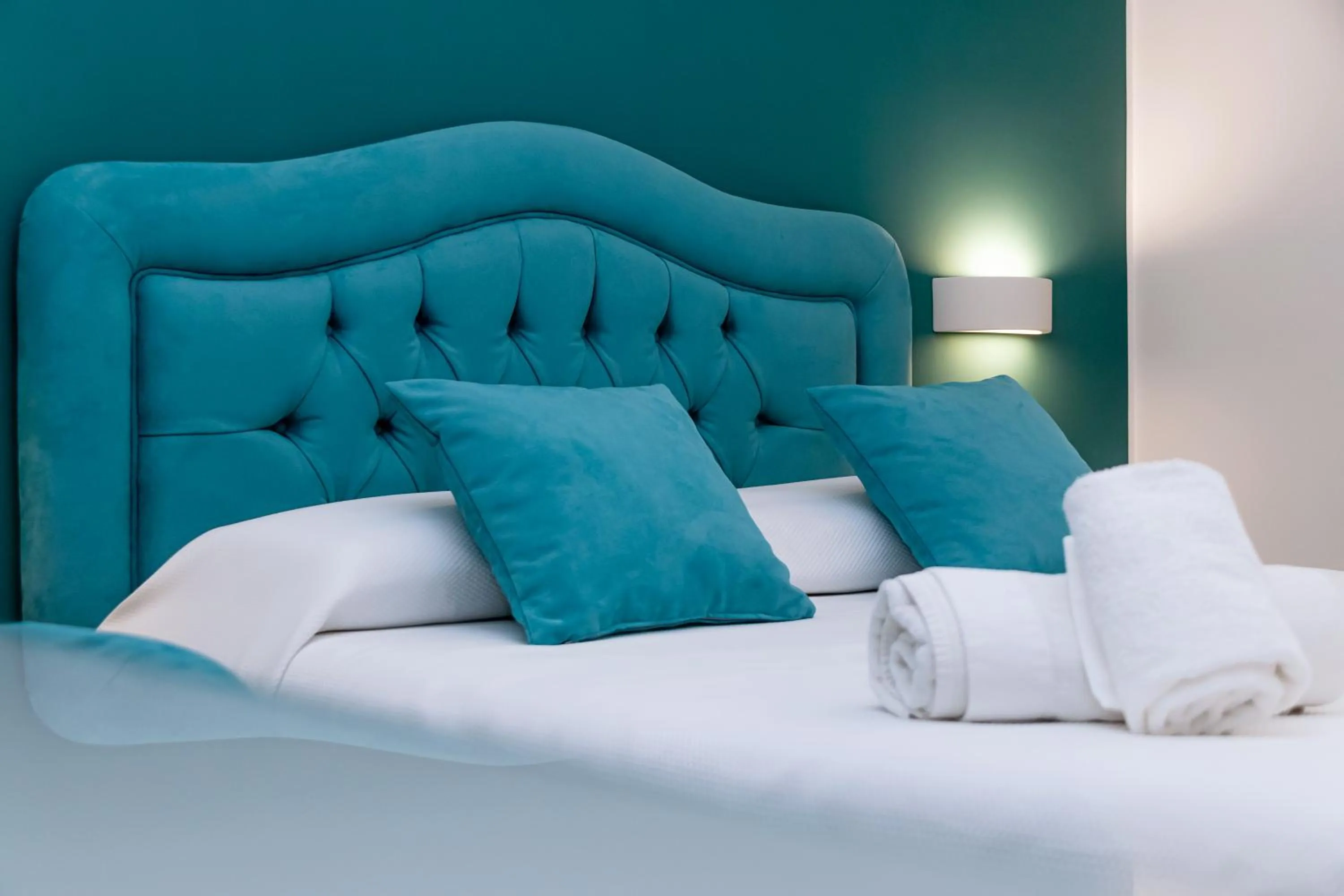 Bed in Tiffany Suites