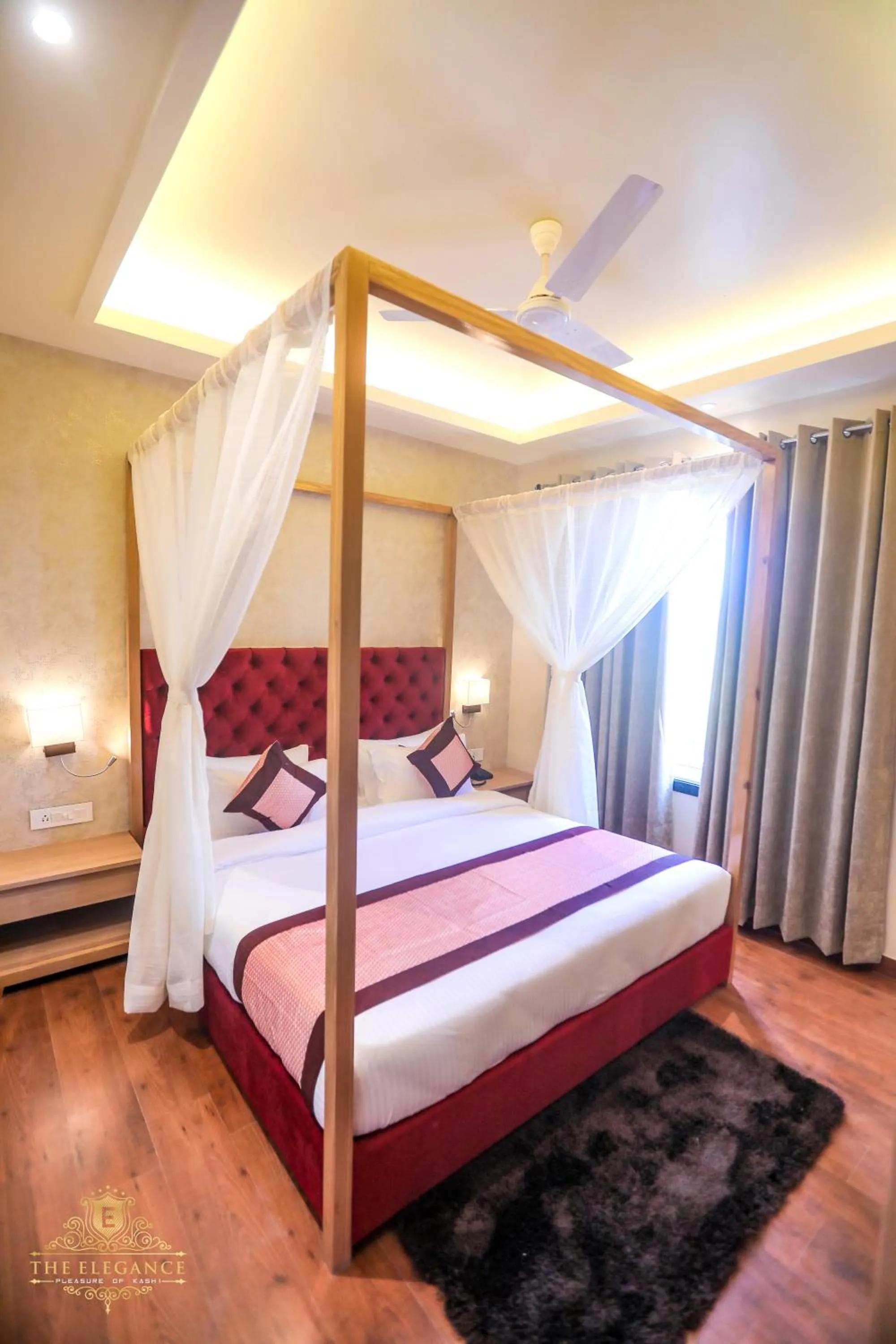 Bed in The Elegance Hotel