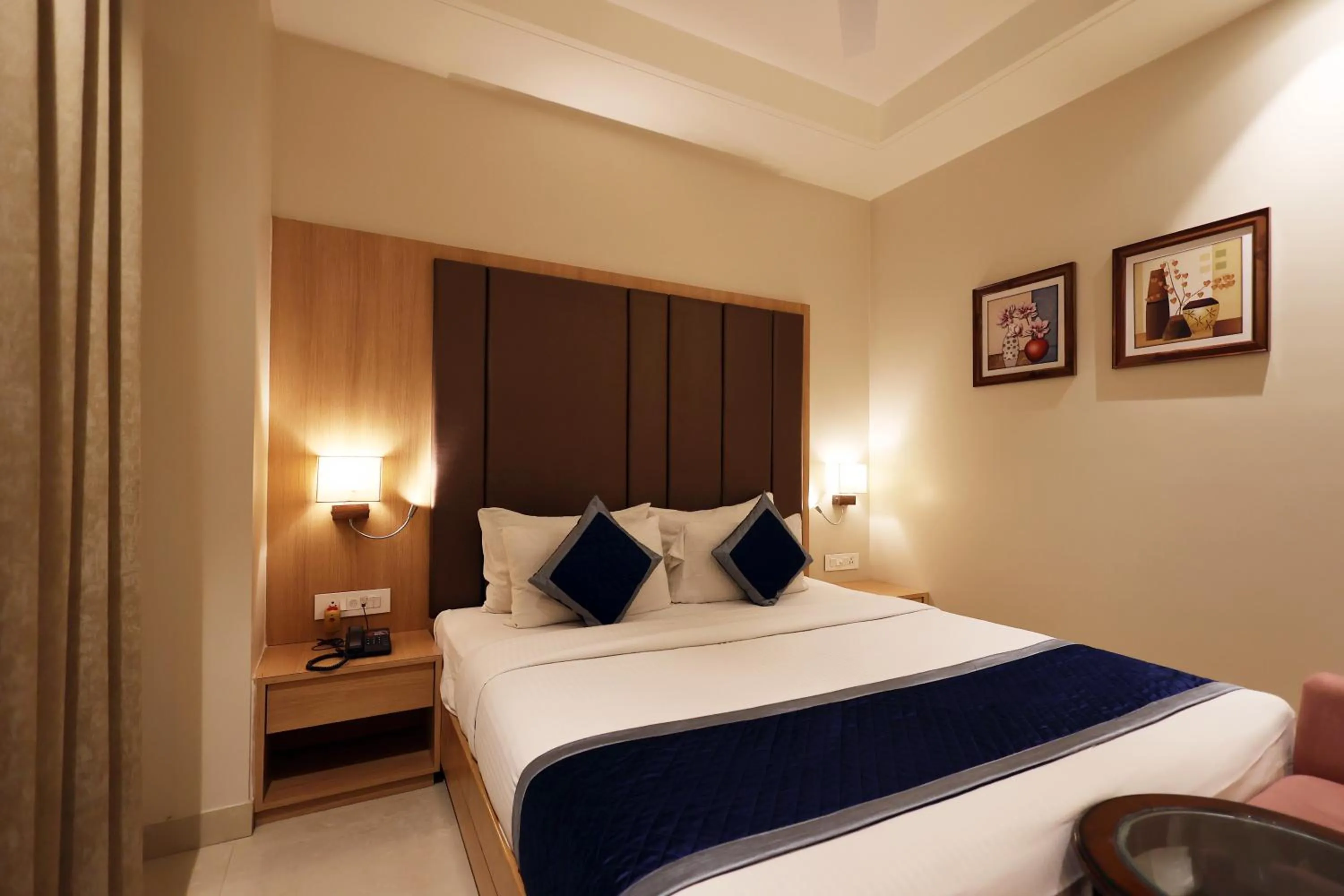 Bed in The Elegance Hotel