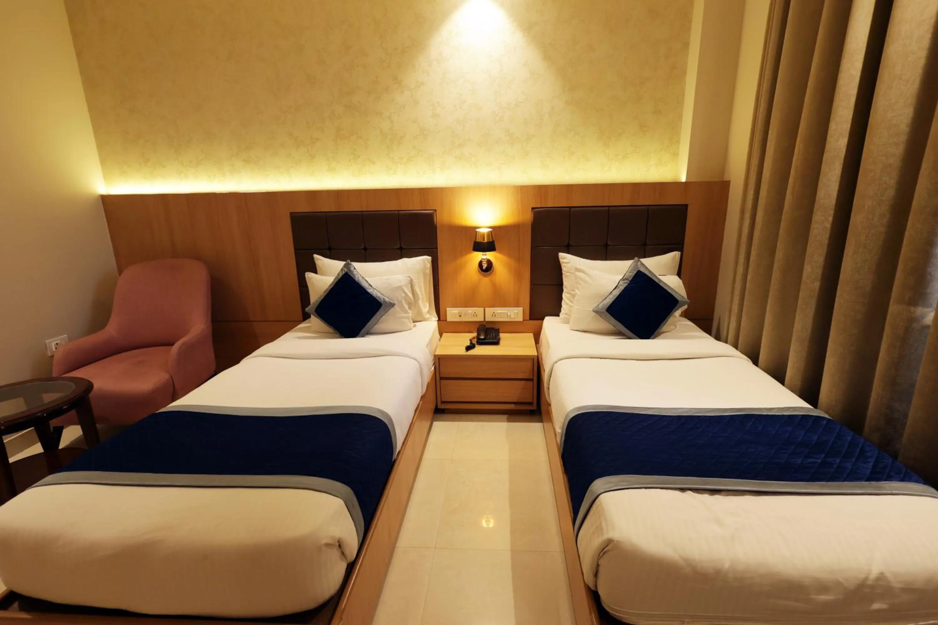 Bed in The Elegance Hotel