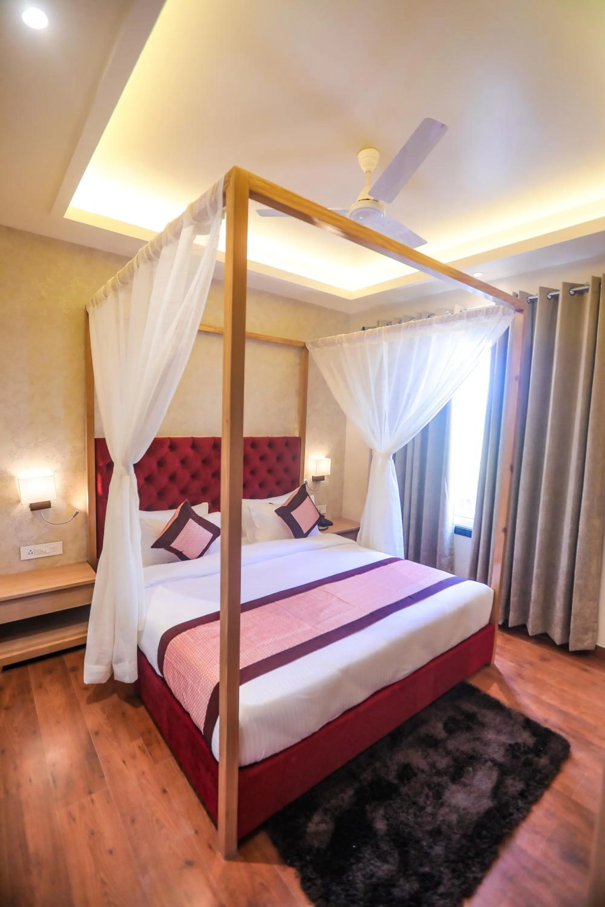 Bed in The Elegance Hotel