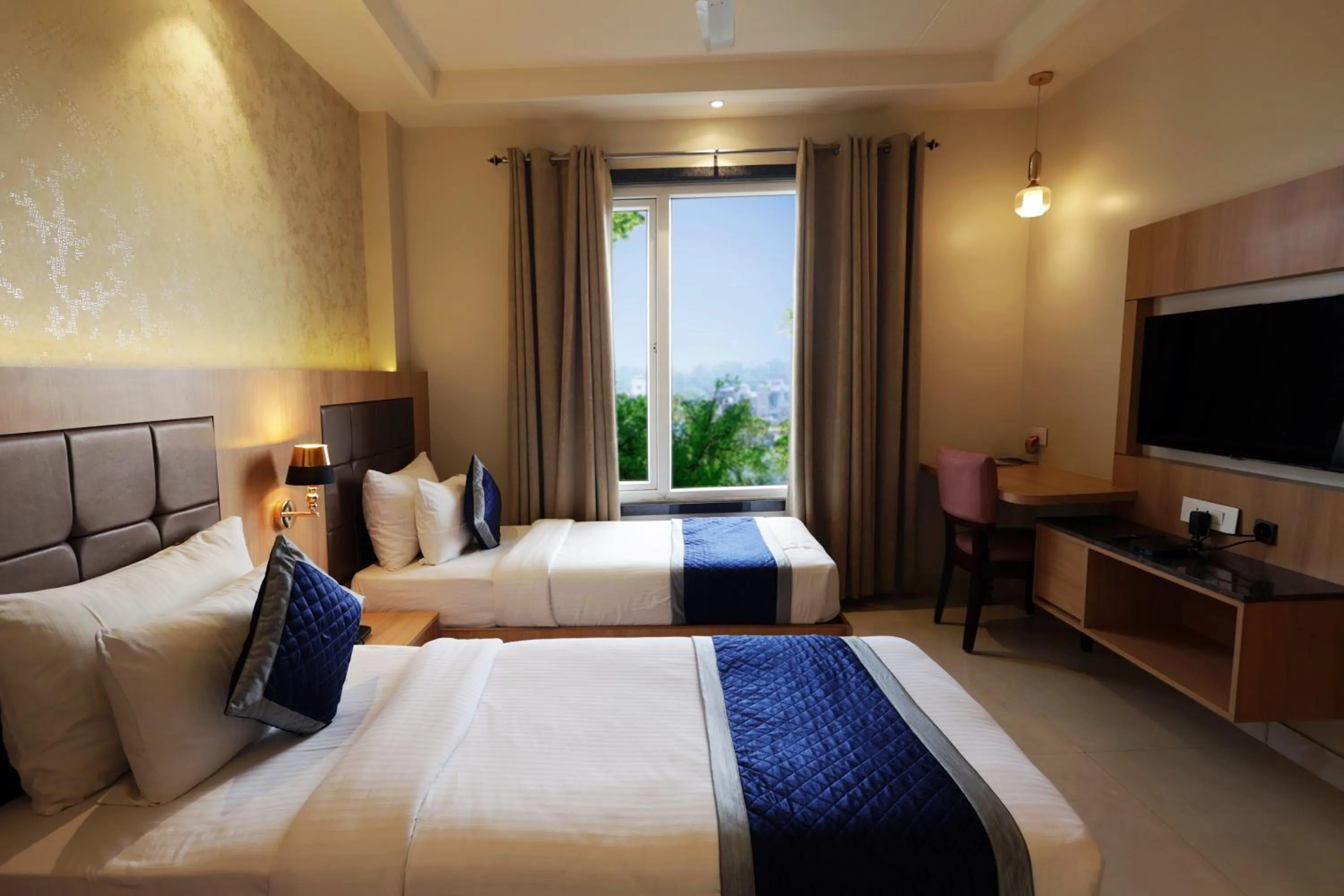 Bed in The Elegance Hotel