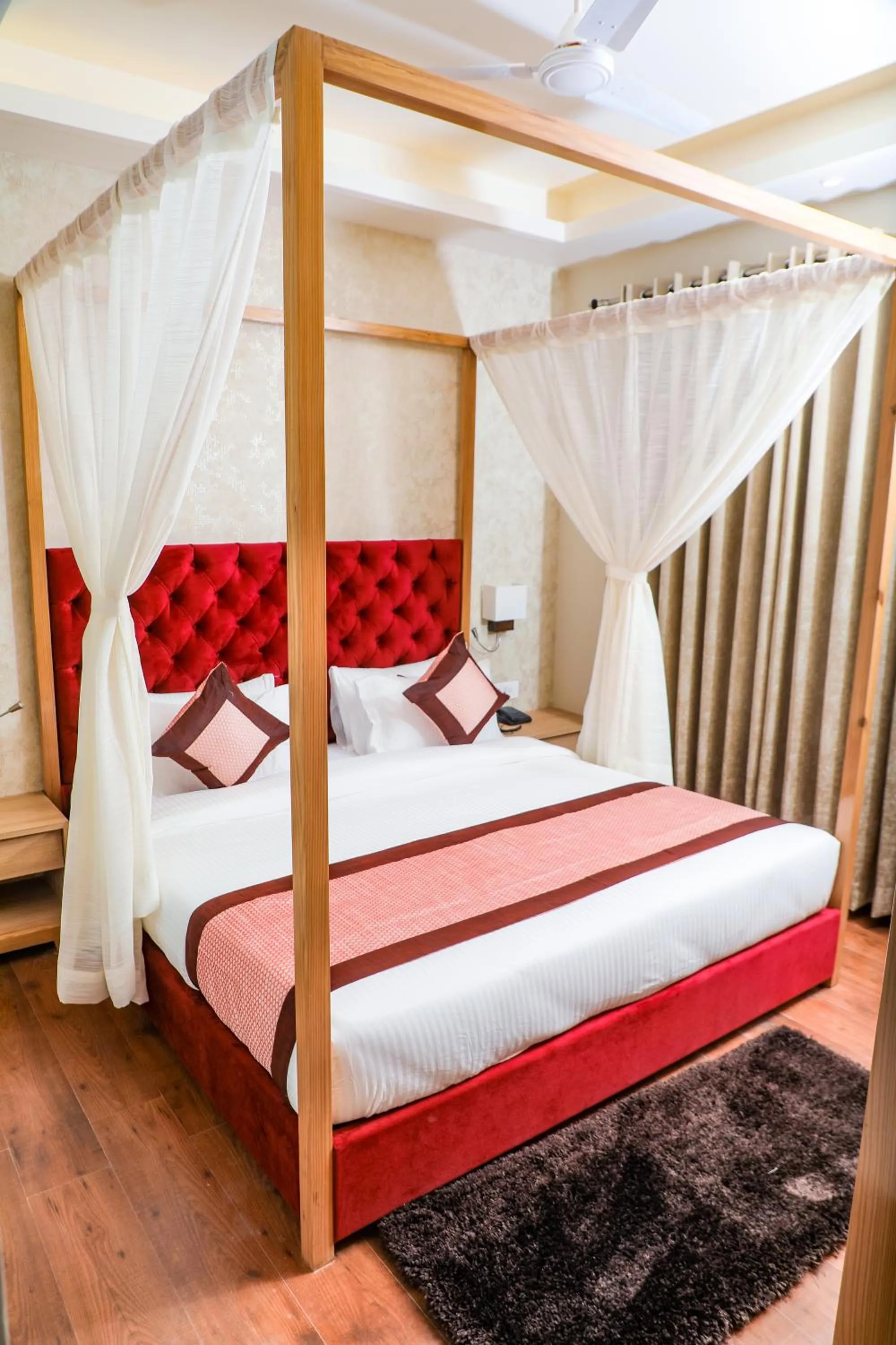 Bed in The Elegance Hotel